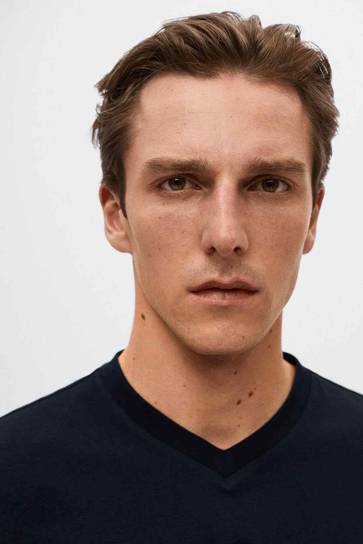 Dark navy V-neck T-shirt neckline close-up