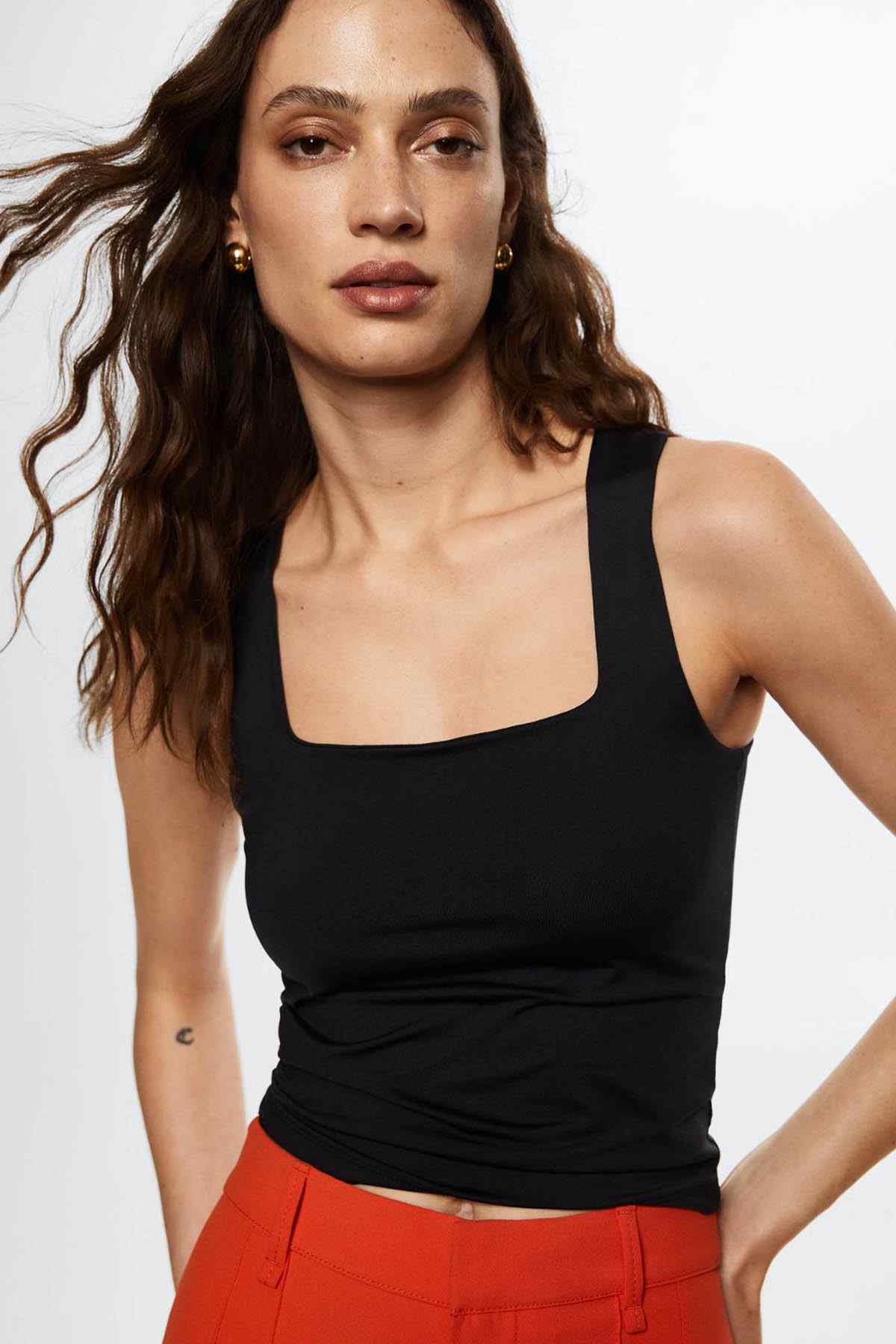 Black sleeveless tank top with square neckline and subtle side ruching