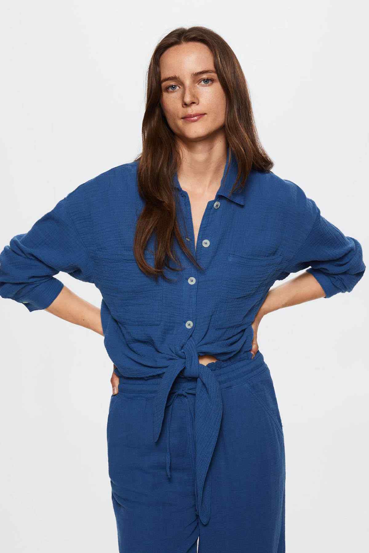 Vibrant blue drawstring wide-leg trousers on model, elastic waist and full-length legs