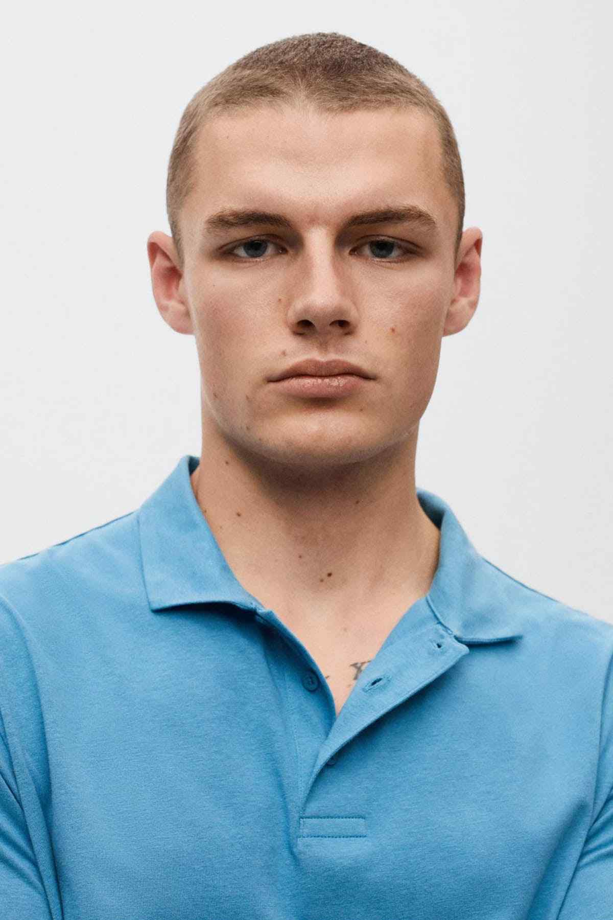 MANGO China Blue polo shirt close-up, button collar and placket details