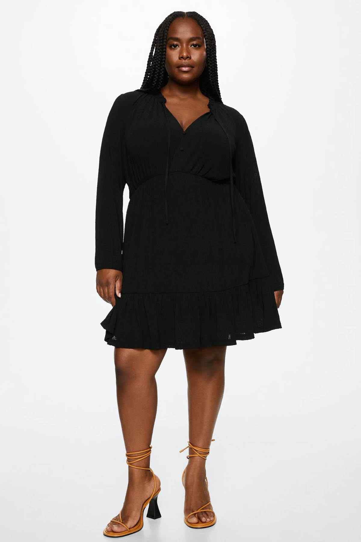 Black long-sleeve V-neck mini dress with button front and elastic waist tiers