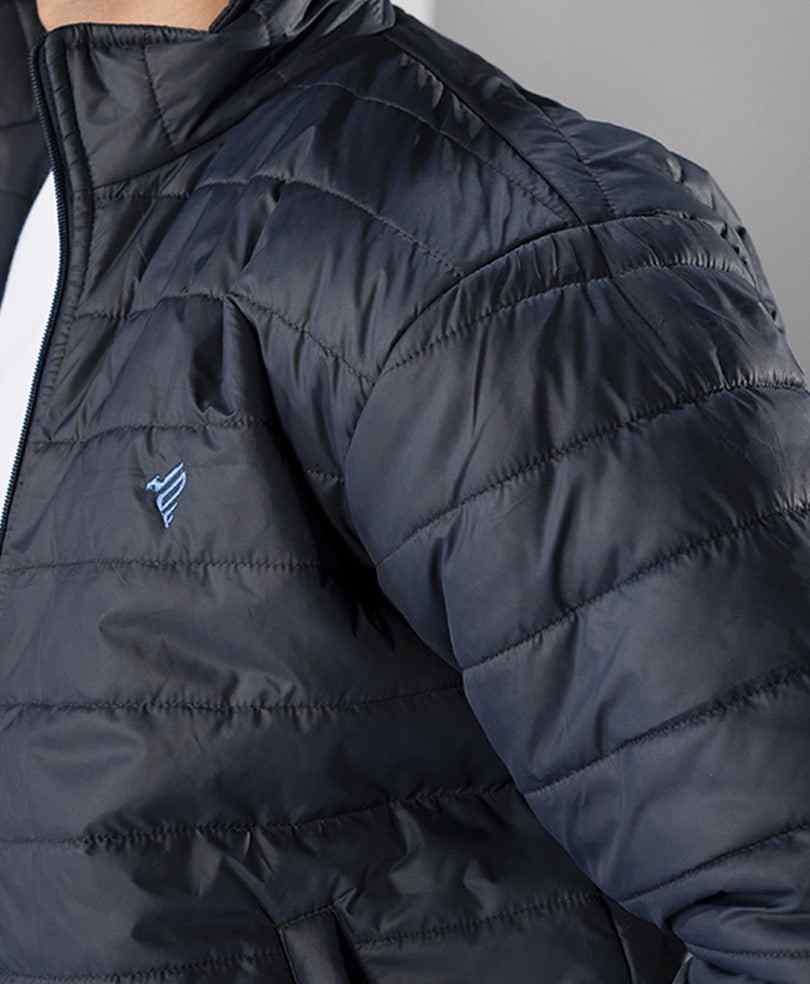 Men's dark navy quilted puffer jacket sleeve and chest, small logo, horizontal baffles