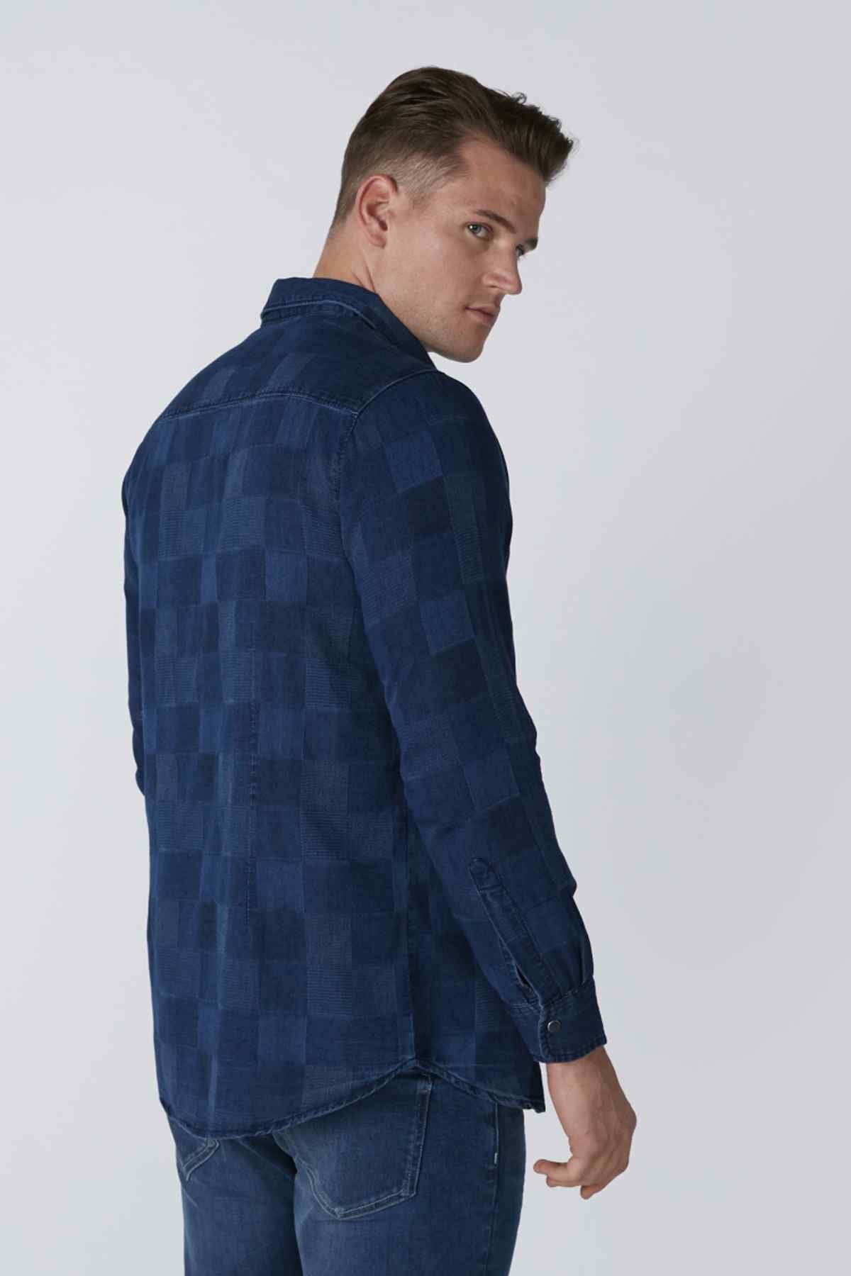 Men's blue check-pattern denim jacket, side profile with buttoned cuff and hem