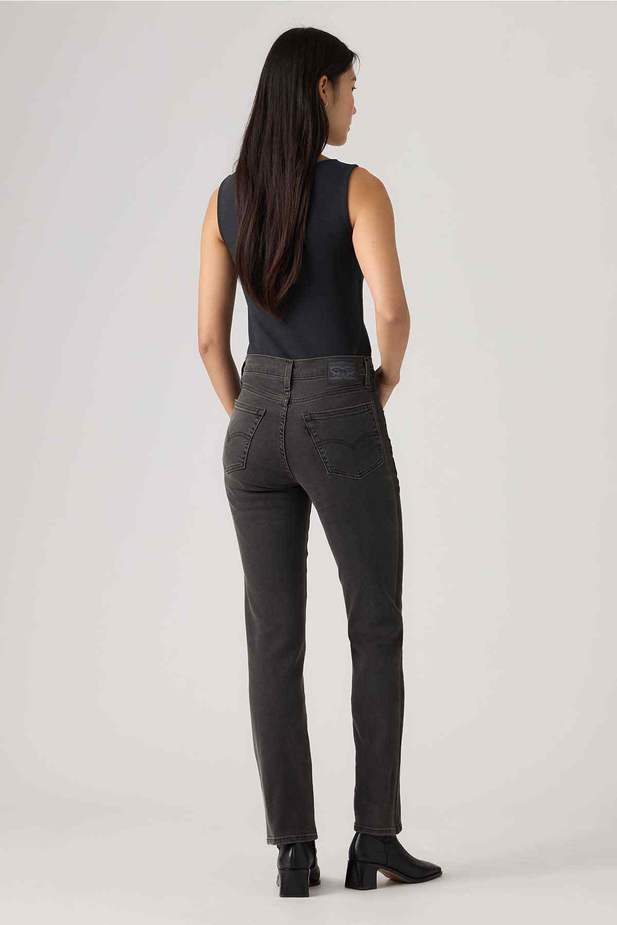 Levi's dark wash denim jeans with back yoke and straight leg silhouette