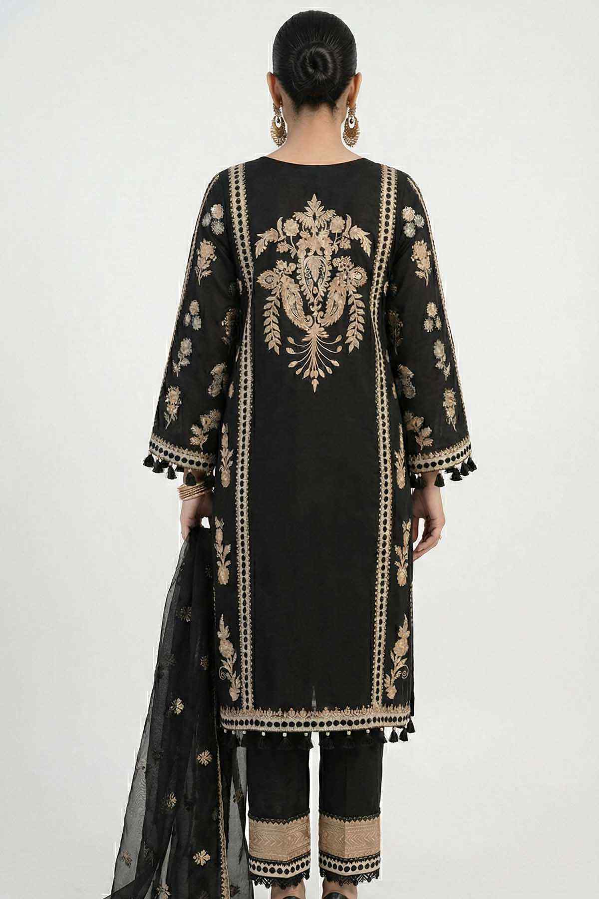 Back view: black embroidered kurta with gold vertical panel and tasselled hem