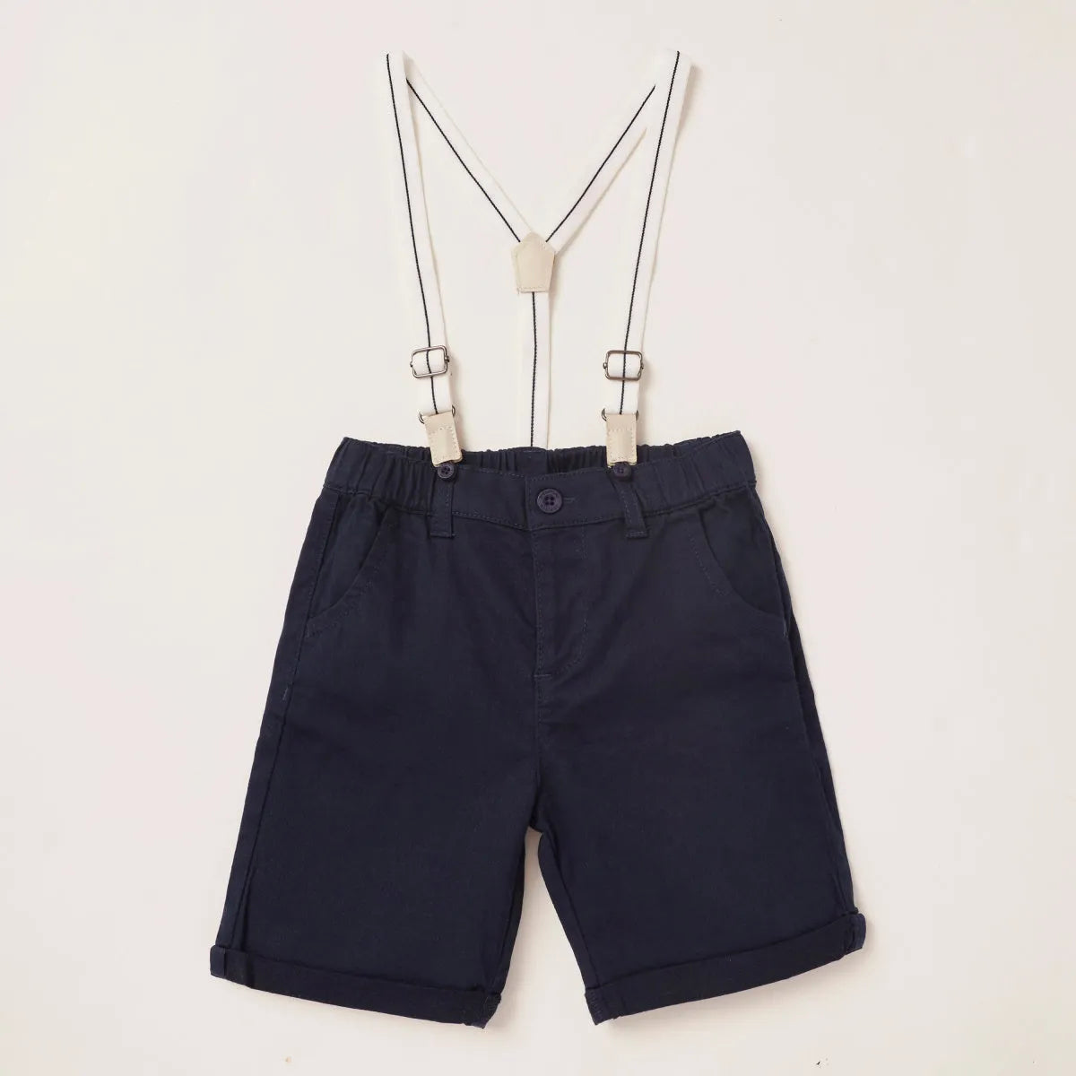 Navy shorts with adjustable beige suspenders and button front