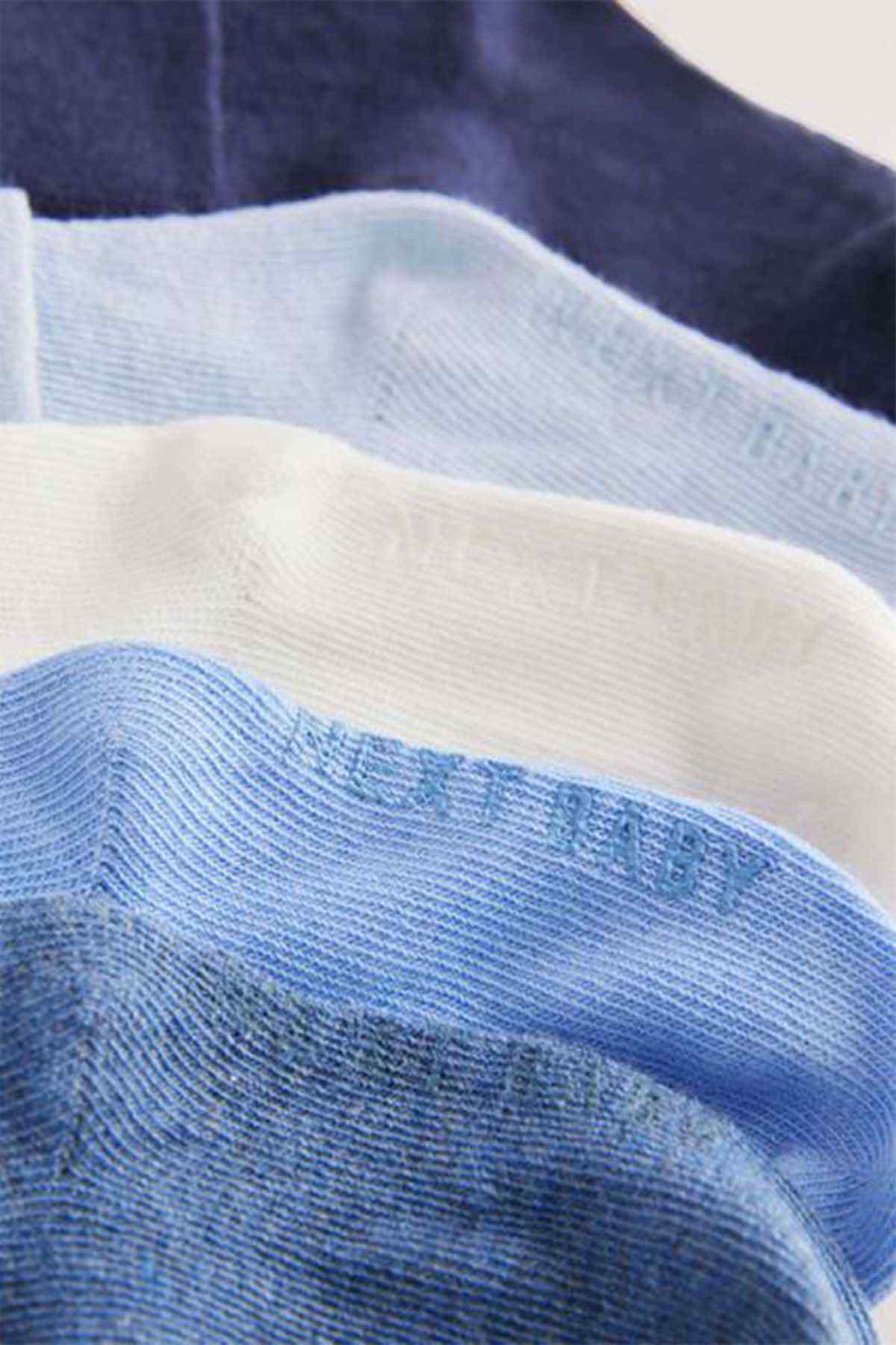 Crew sock close-up in light blue and white with ribbed knit cuff
