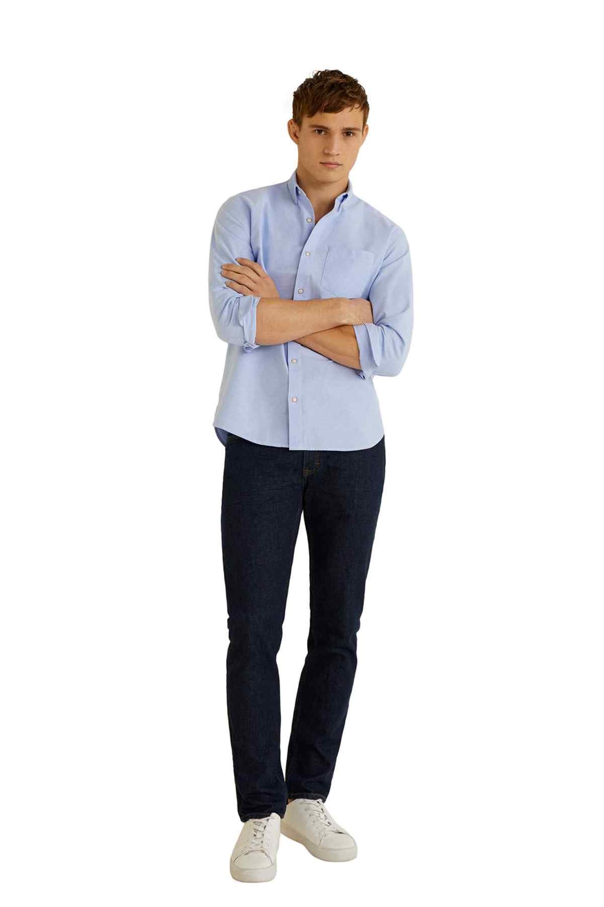 Men's light blue button-up shirt, front view, long sleeves, button placket