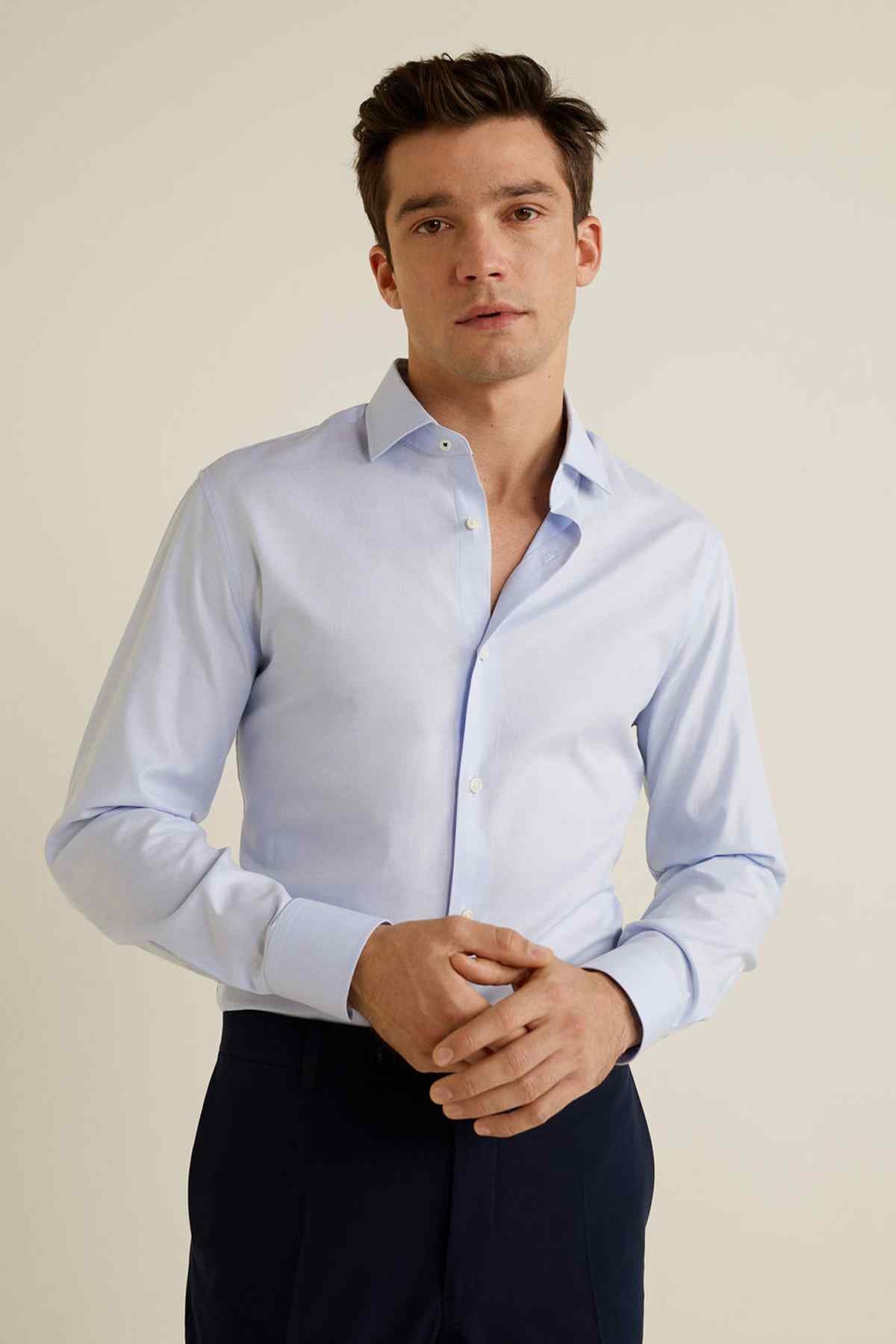 Men's sky-blue dress shirt with buttoned cuffs and front button placket