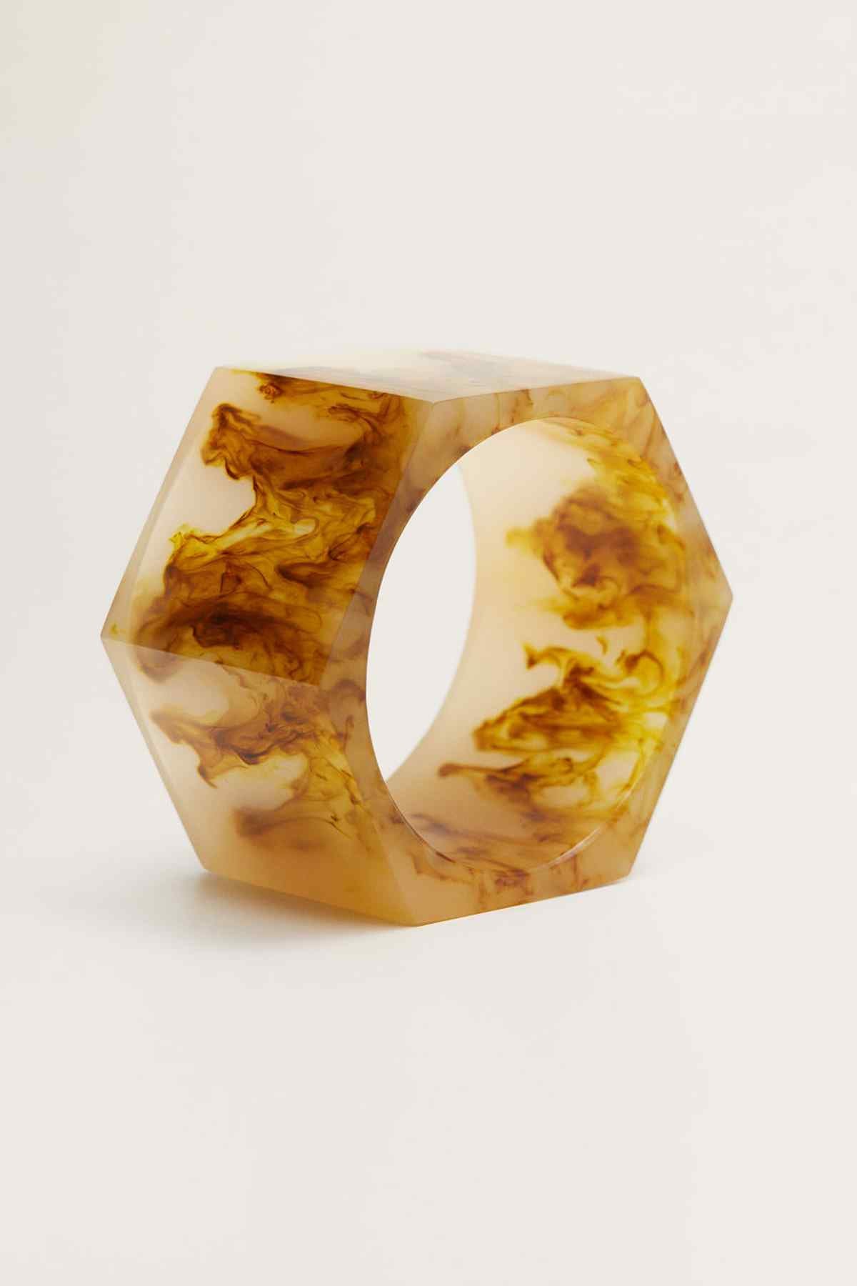 Marbled amber resin bangle bracelet, open cuff view with medium brown golden swirls