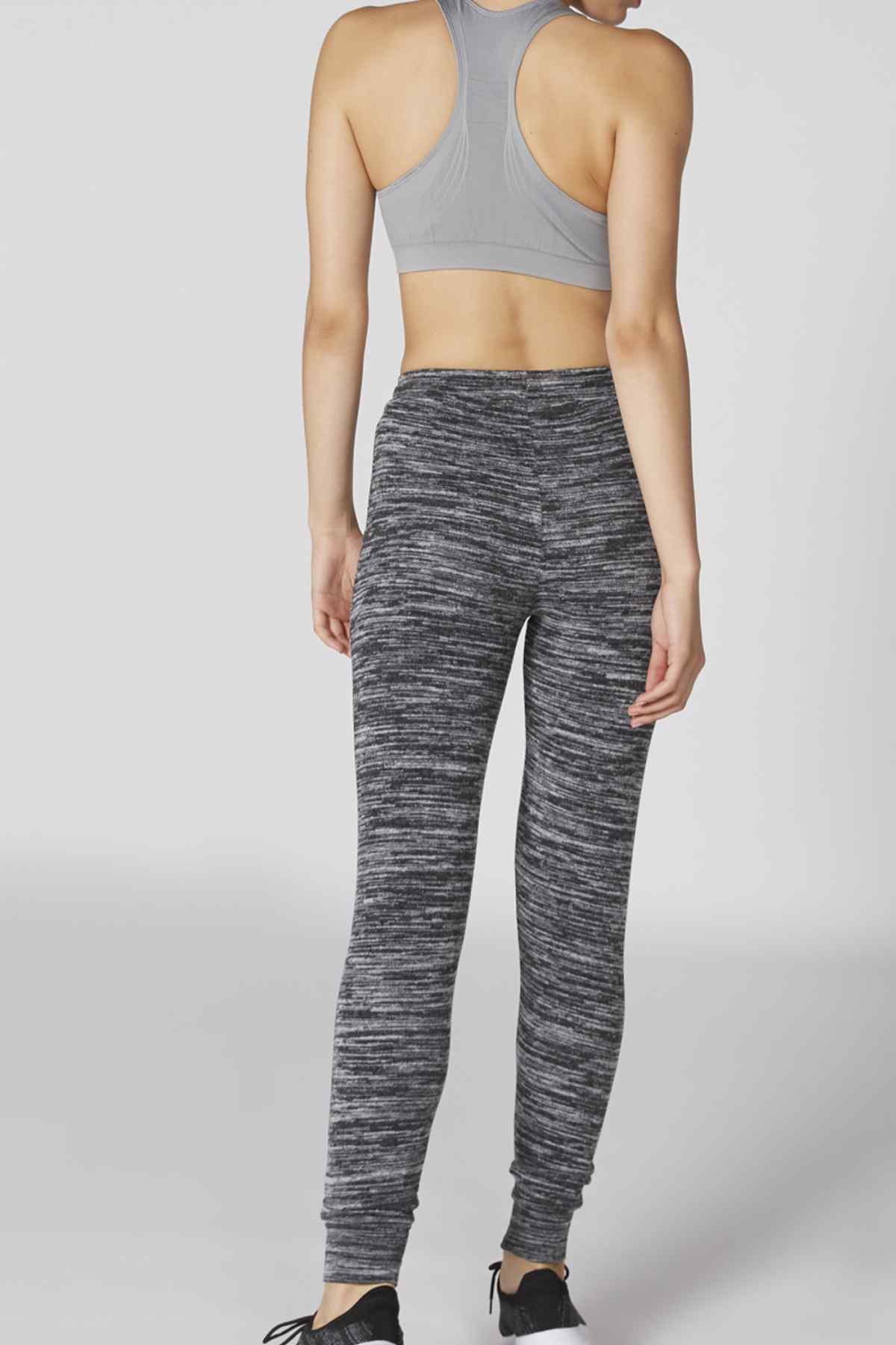 Heather grey sports bra and heather leggings, back view with racerback straps