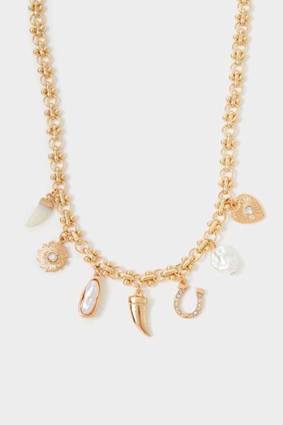 Accessorize gold chain necklace with assorted hanging charms and heart pendant