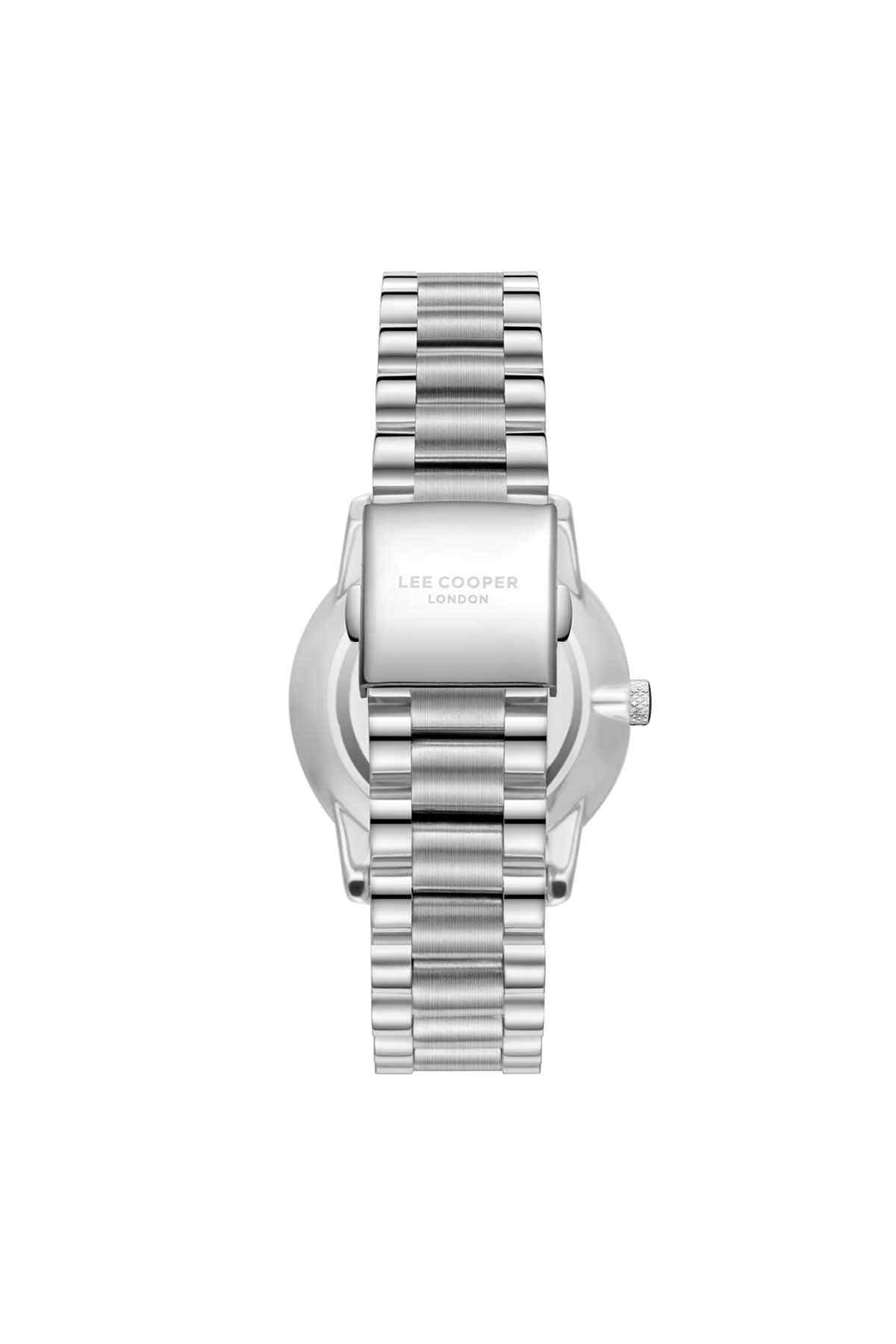 Silver metal wristwatch with green dial and ridged bezel, side profile view
