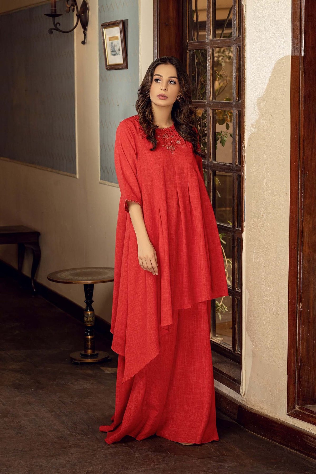 Red velour maxi dress with 3/4 sleeves, round neckline, layered drape skirt
