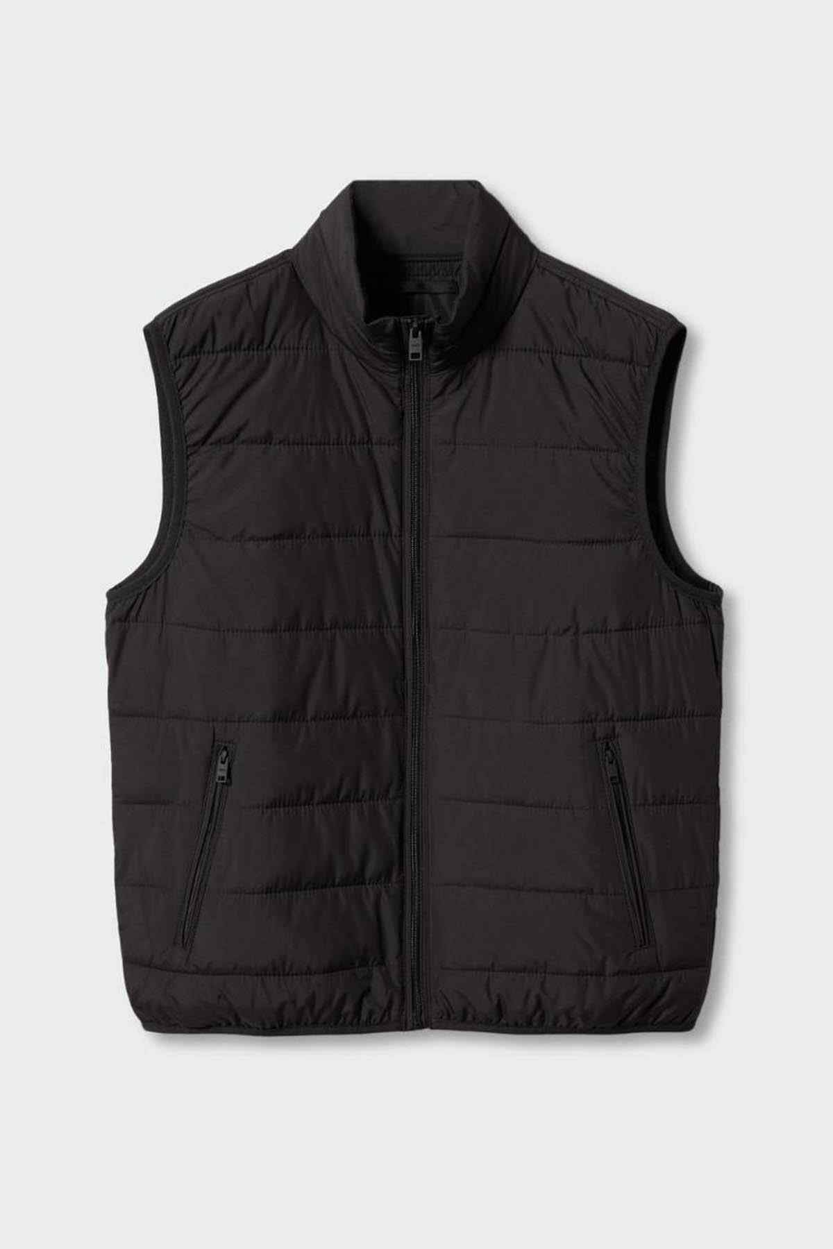 Black quilted sleeveless vest with stand collar and central zip