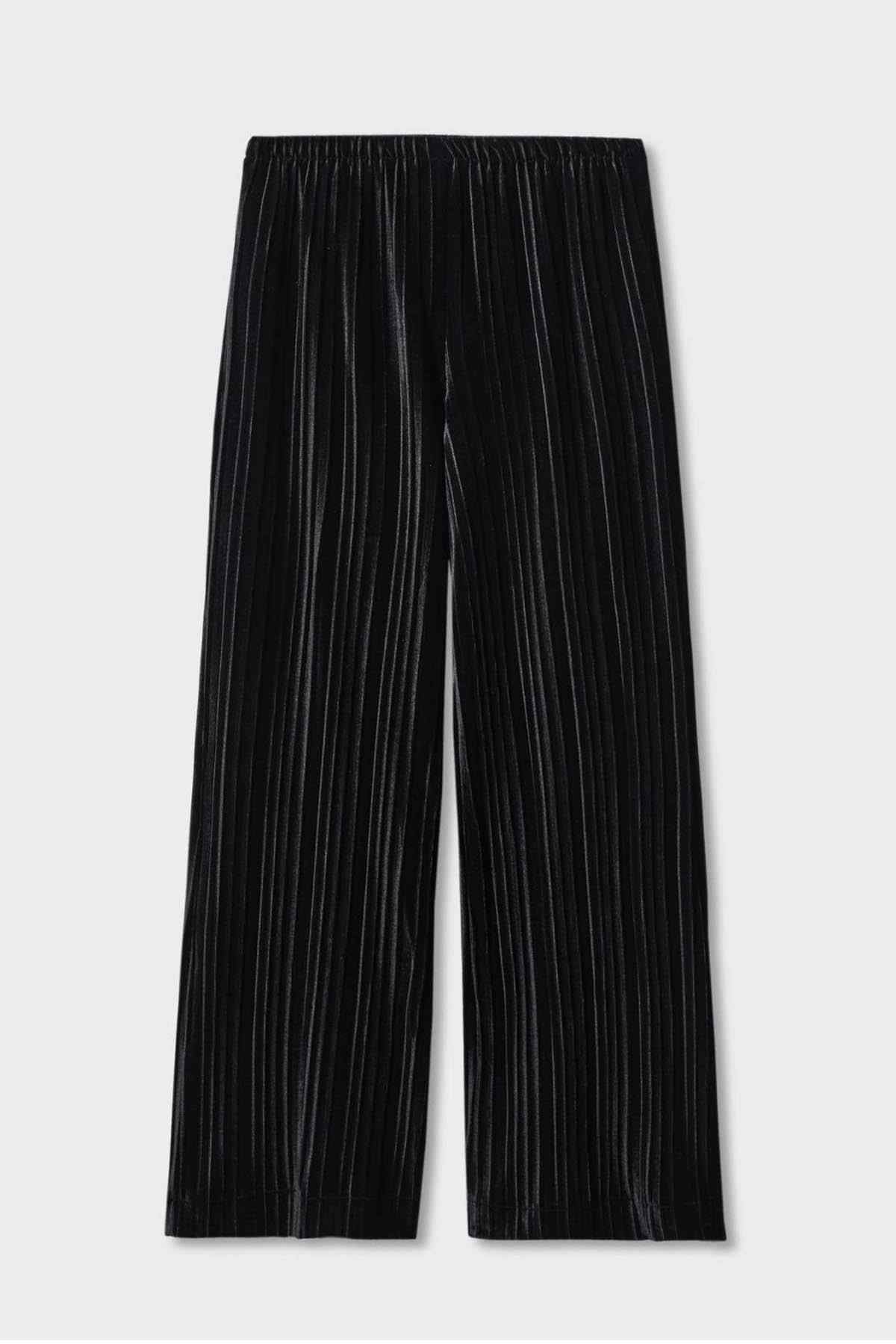 Black wide-leg trousers laid flat with vertical pleated pinstripe pattern