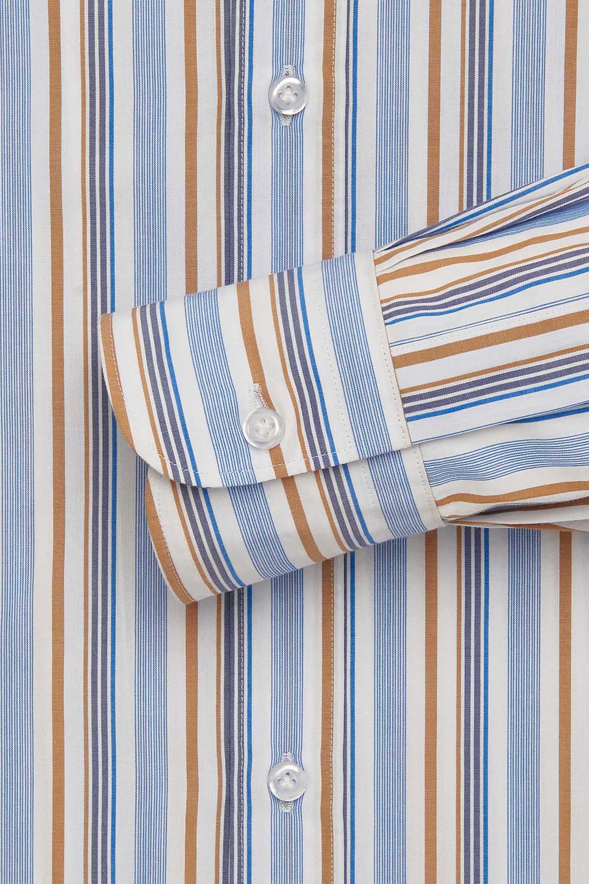 Striped dress shirt cuff with round button, blue and brown vertical stripes