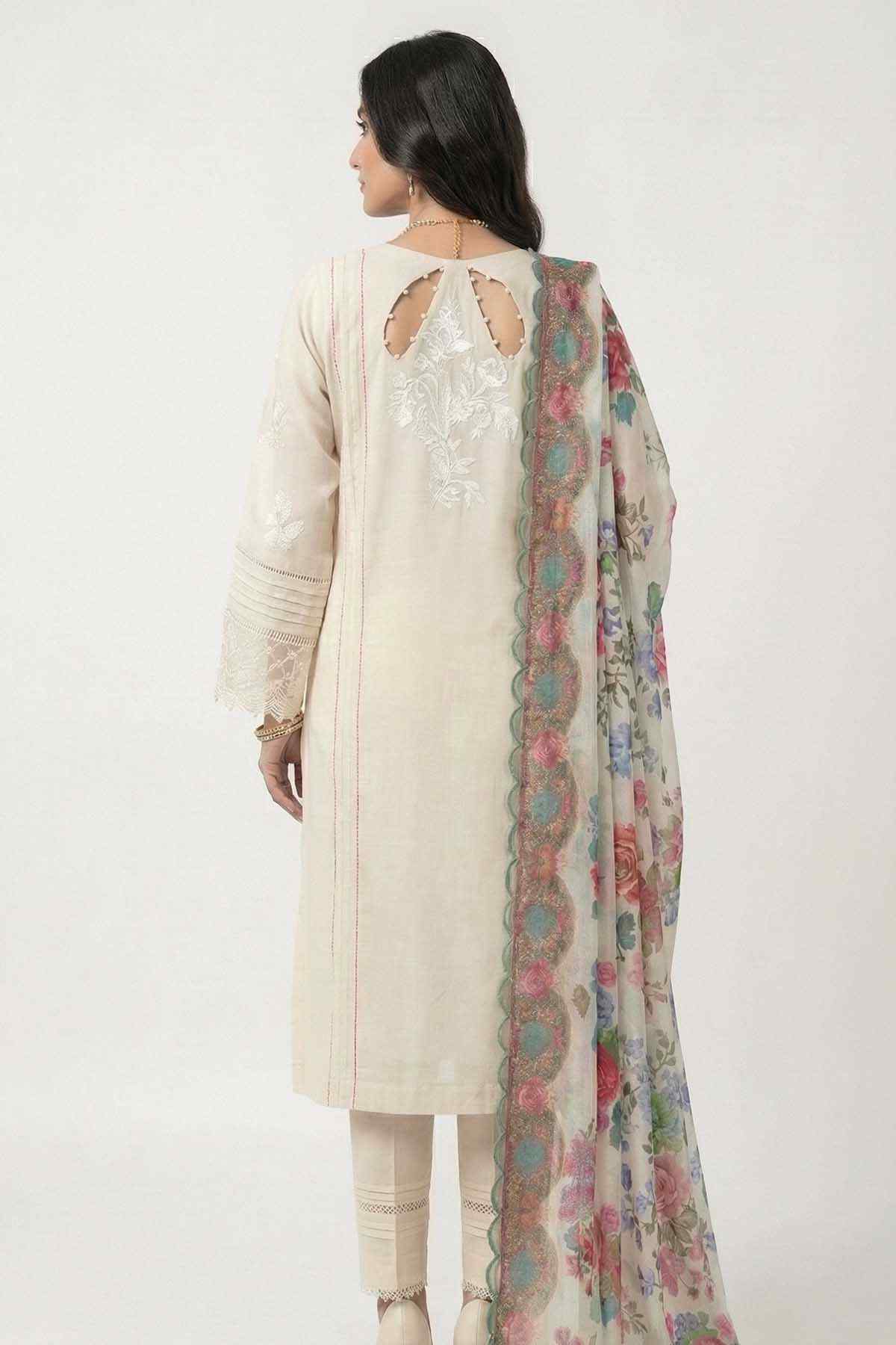 Ivory back of kurta with floral sheer dupatta draped over shoulder; matching pants