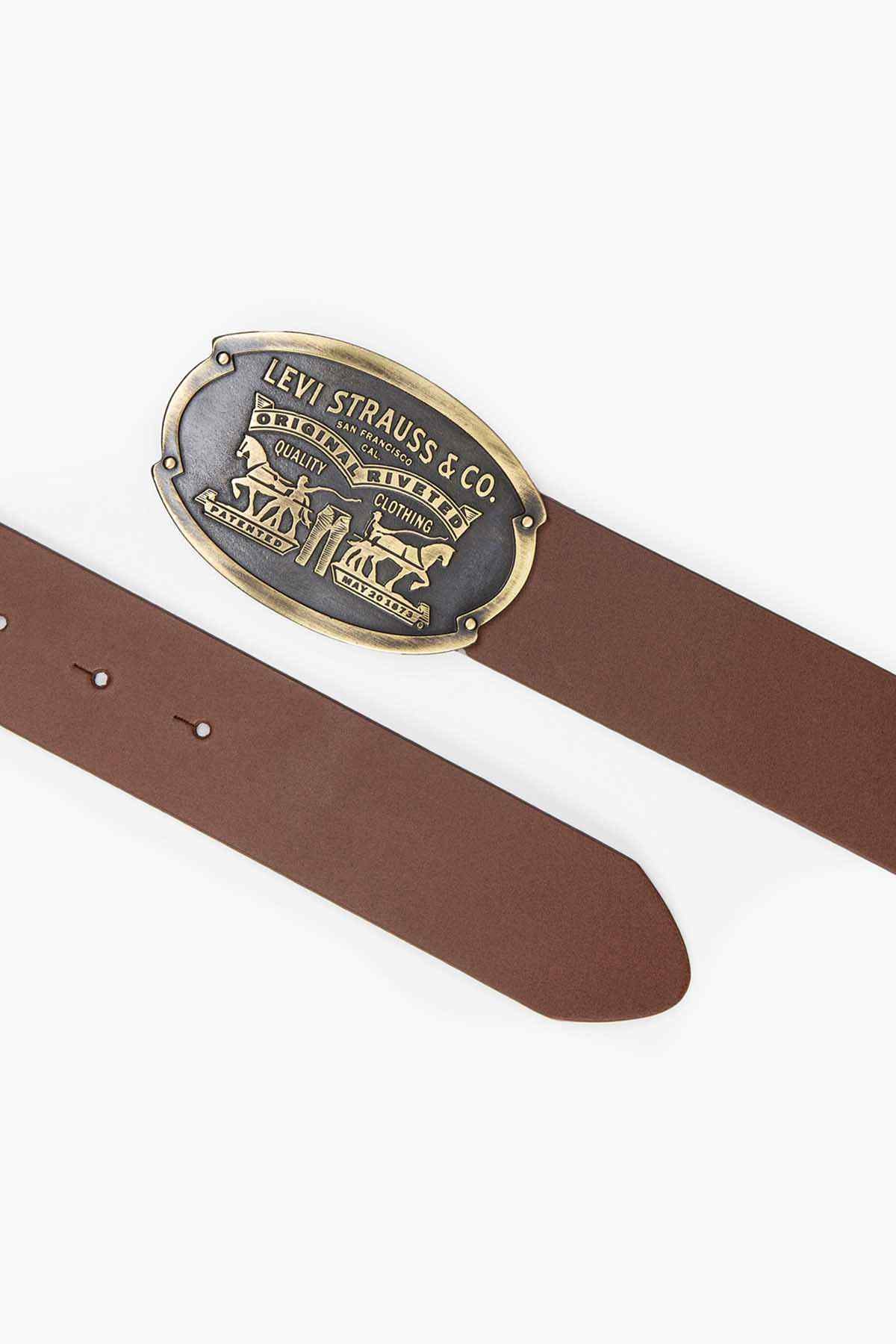 Brown leather belt with oval logo buckle and metal prong, pin holes