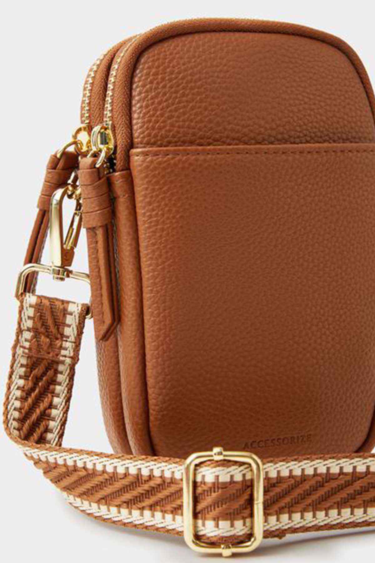 Accessorize tan crossbody bag front close-up with braided strap and gold clasp
