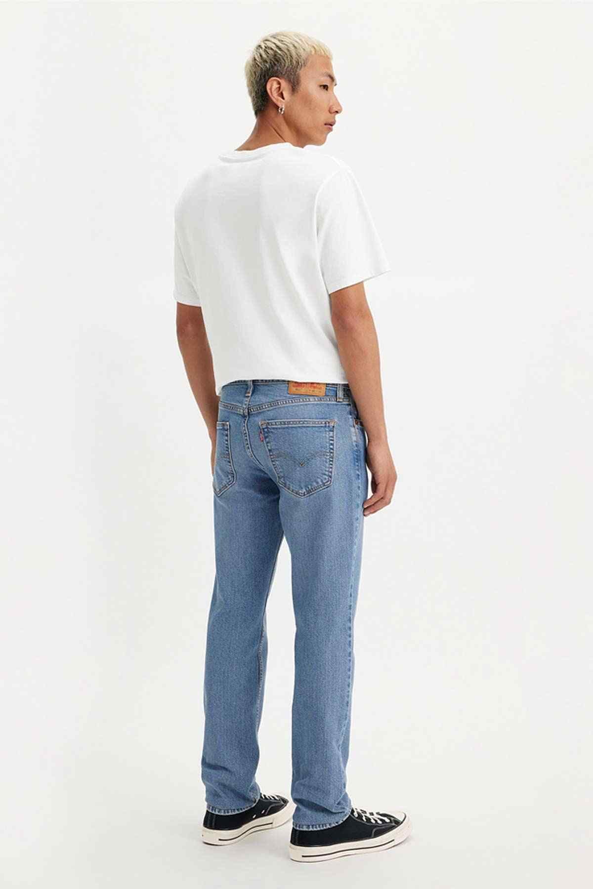 Levi's medium indigo denim jeans back view, yoke stitching and back pockets
