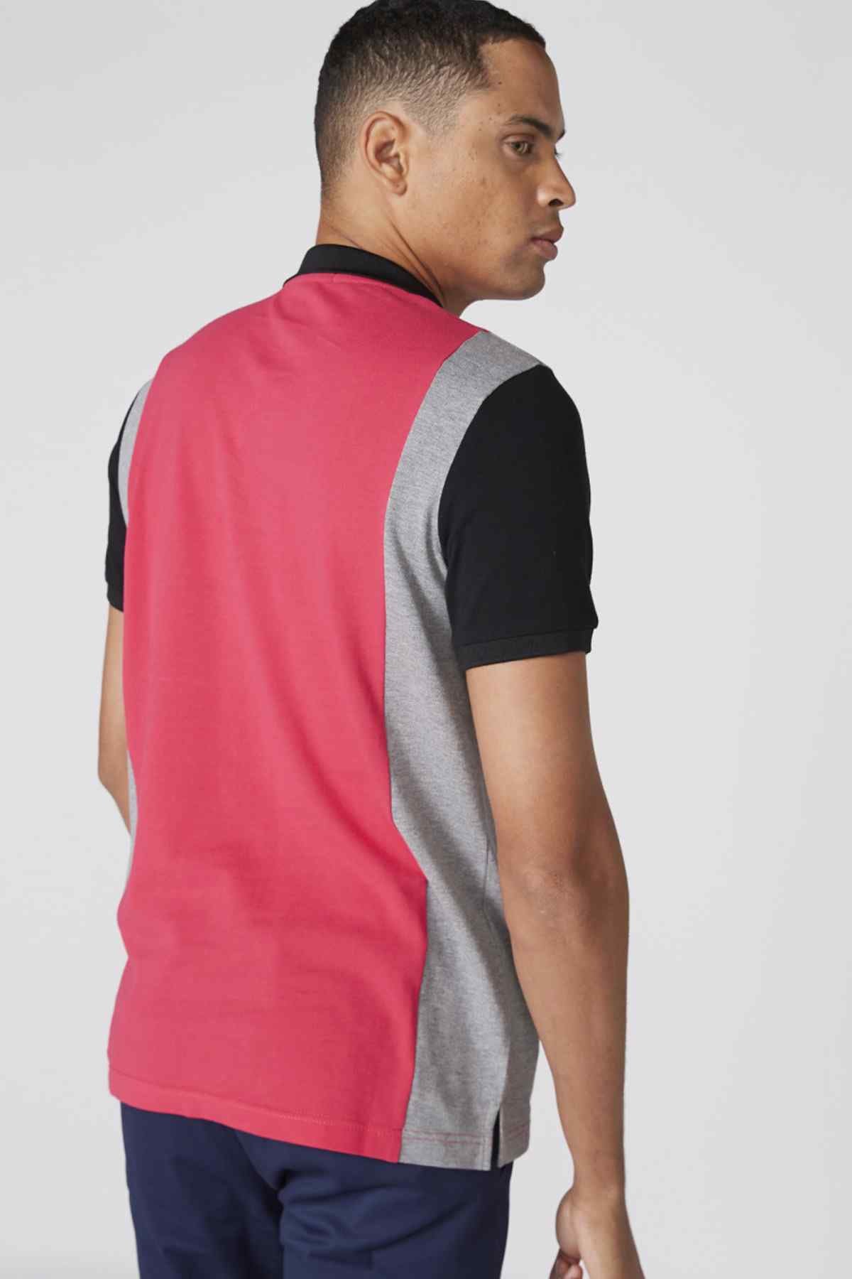 Men's red color-block polo shirt with gray side panels and black collar, side view.
