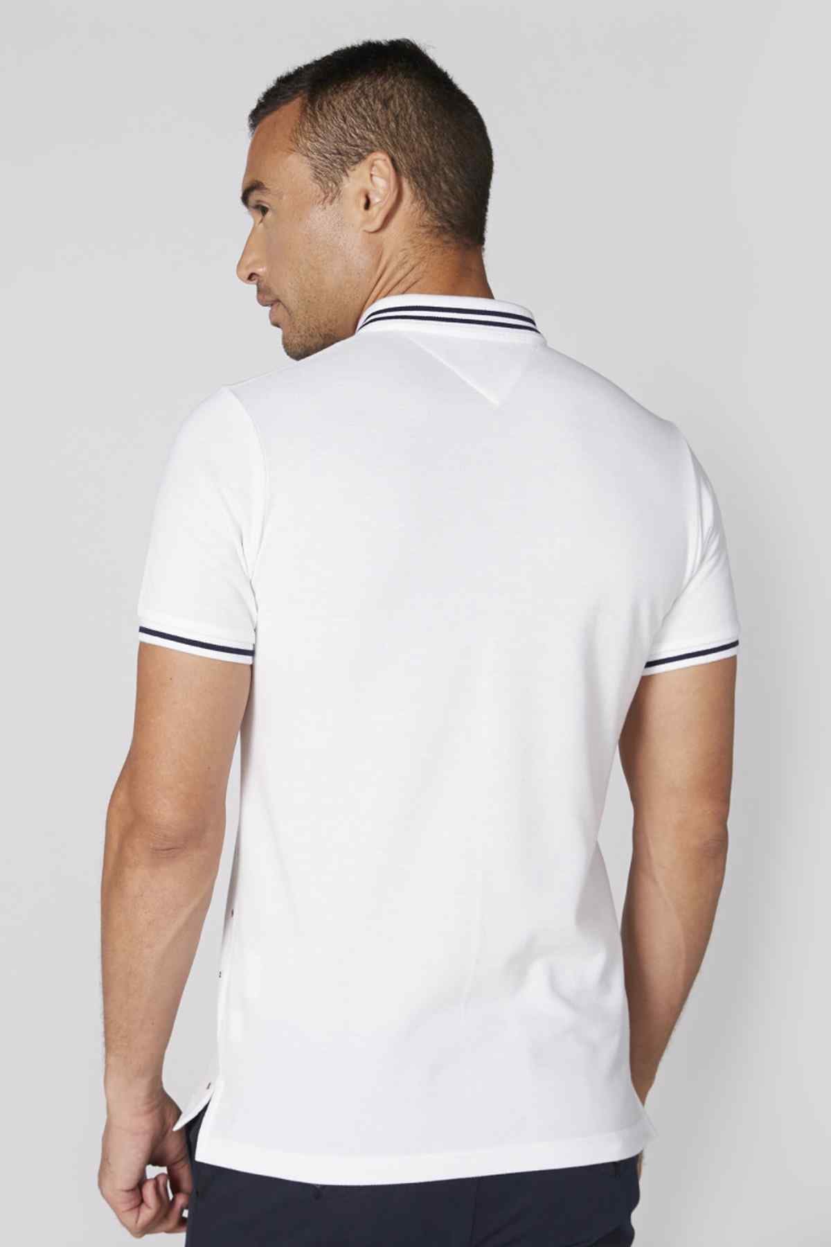 White patterned polo shirt, back view, striped collar and short sleeves