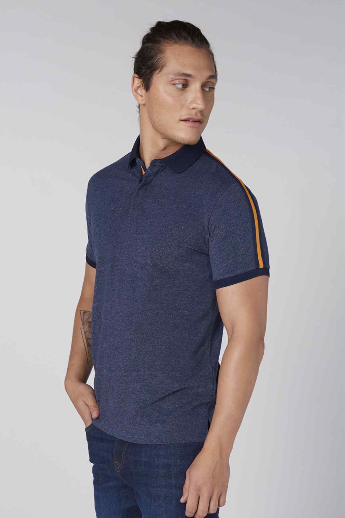 Navy polo shirt with orange-trim collar and sleeve stripes, short button placket