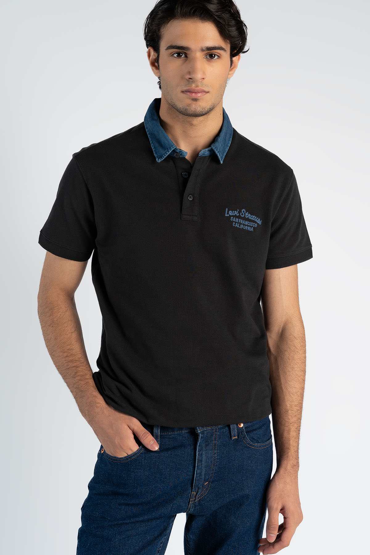Black Levi's polo shirt with blue collar and front button placket