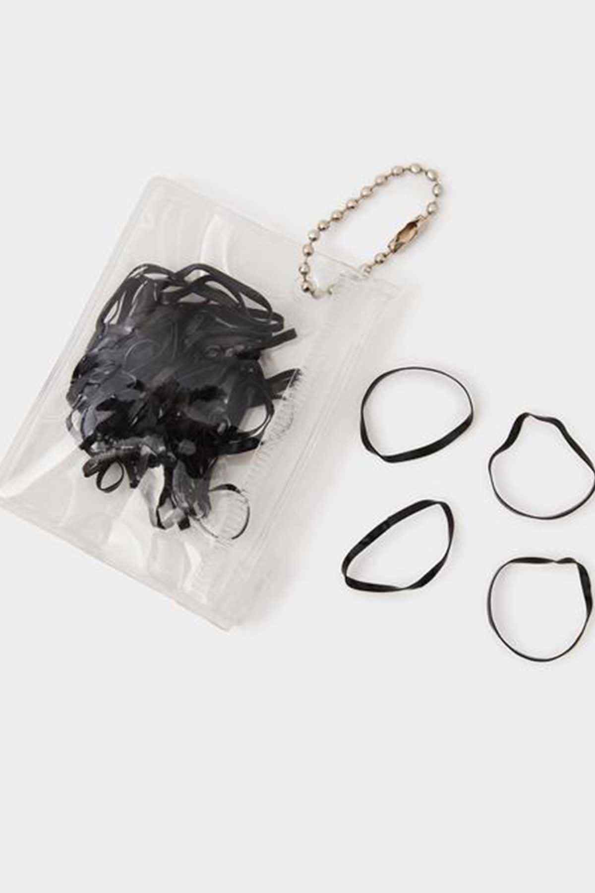 Black hair tie set with beaded bracelet in clear pouch