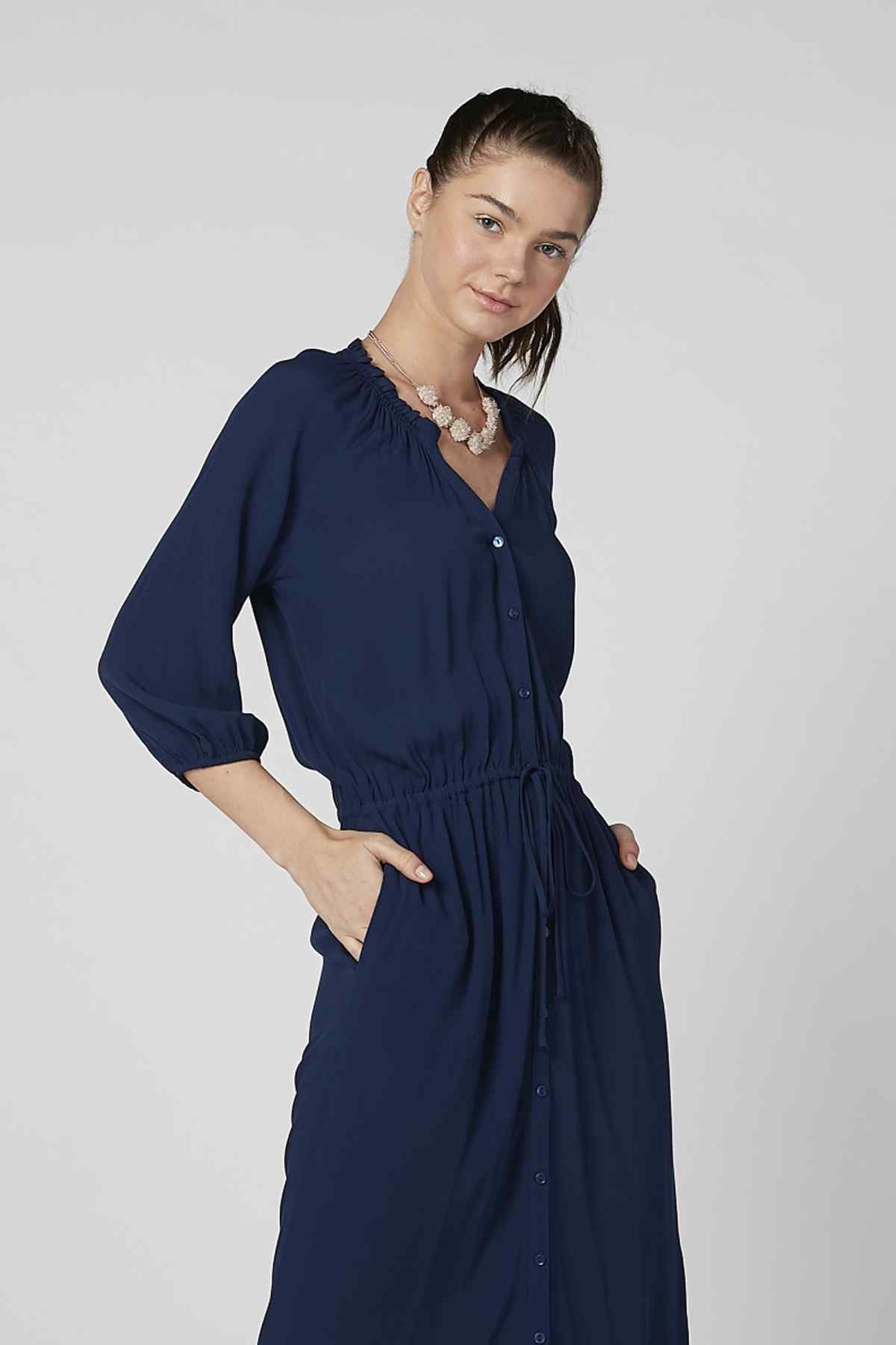 Dark navy long-sleeve midi dress with lace V-neck, button front, ruched waist