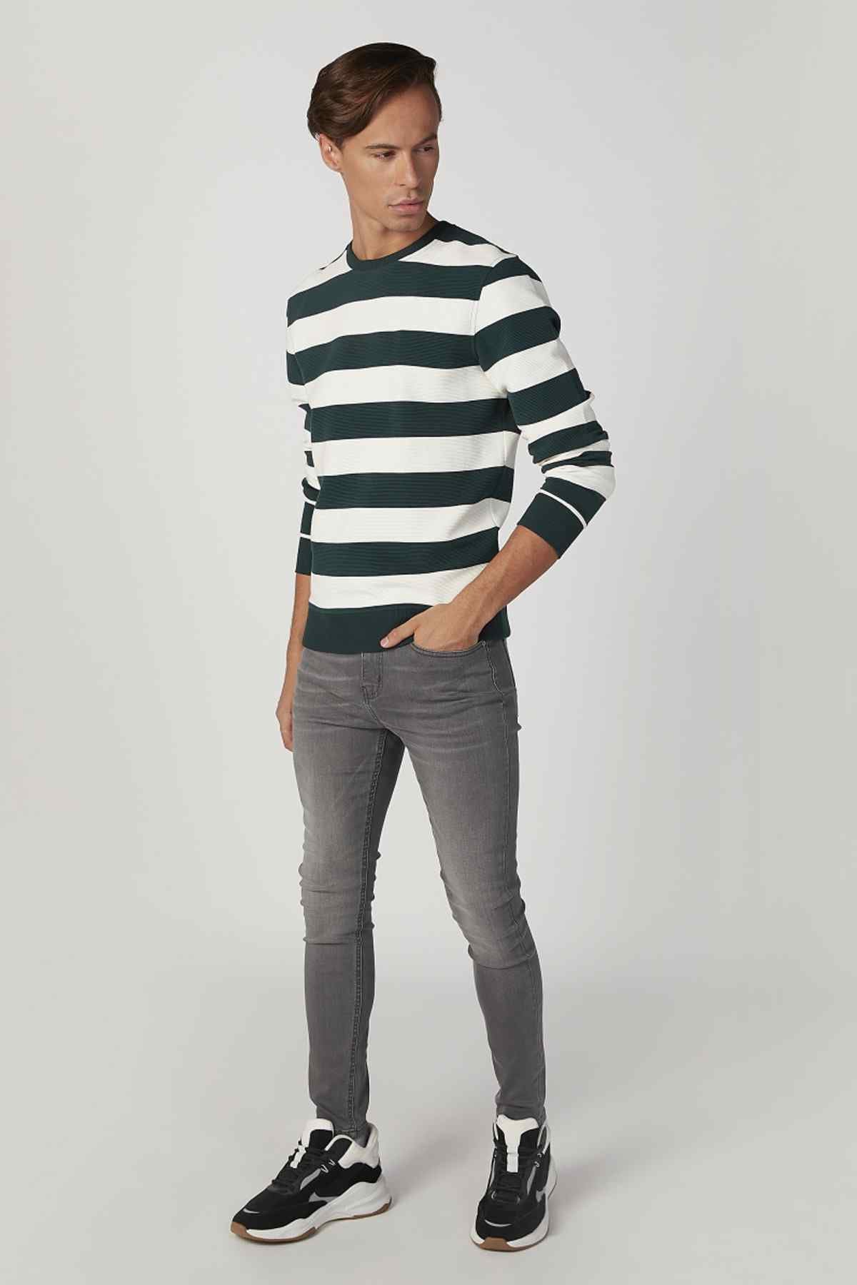 Men's dark green and white striped crewneck sweater, full body view