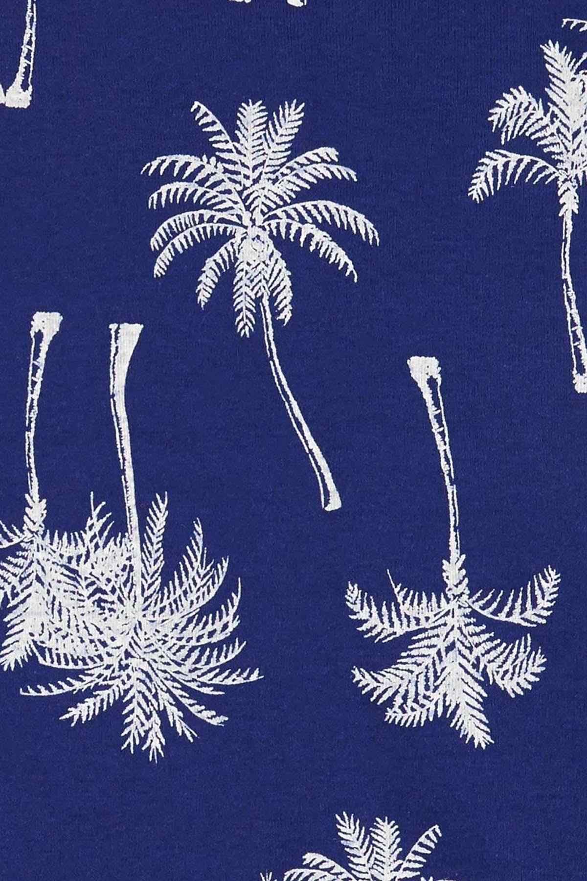 Navy knit fabric with white palm tree and frond print