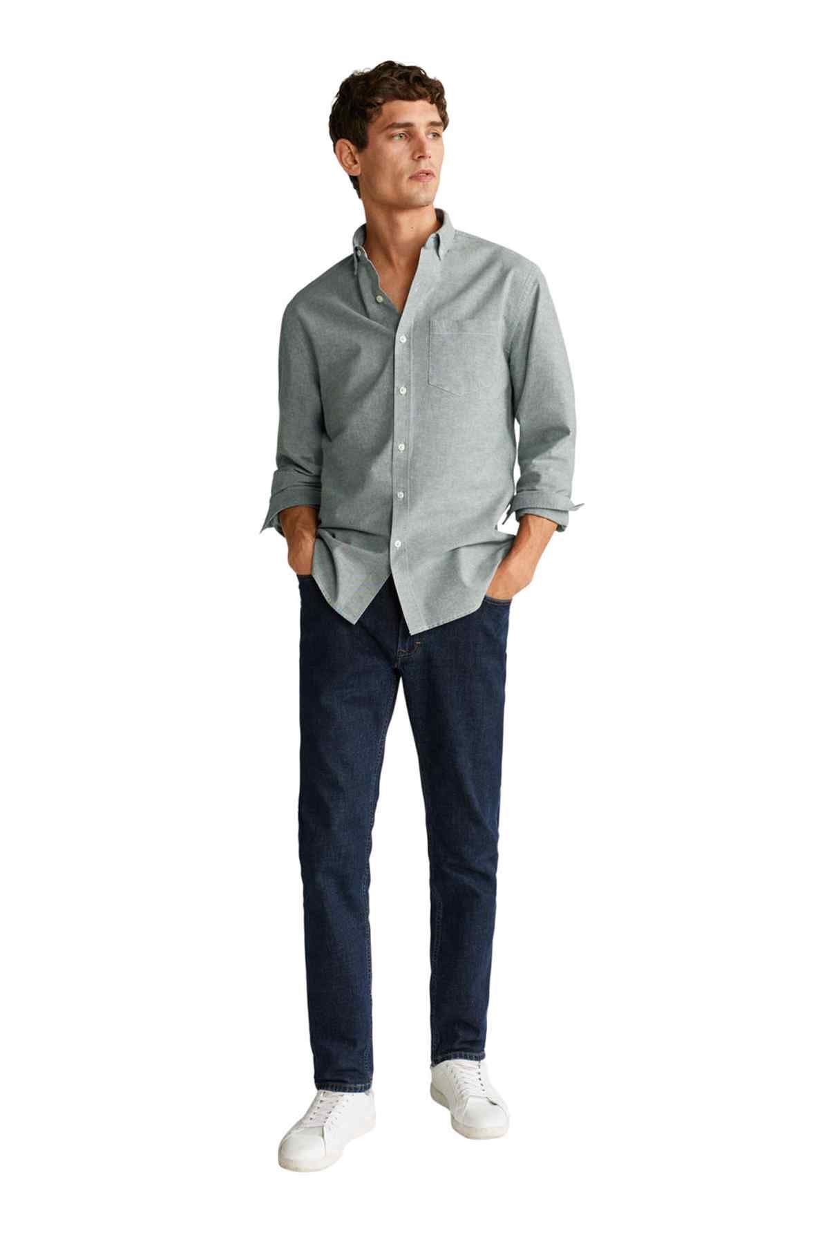 Men's gray button-up shirt, cufed long sleeves, front half visible