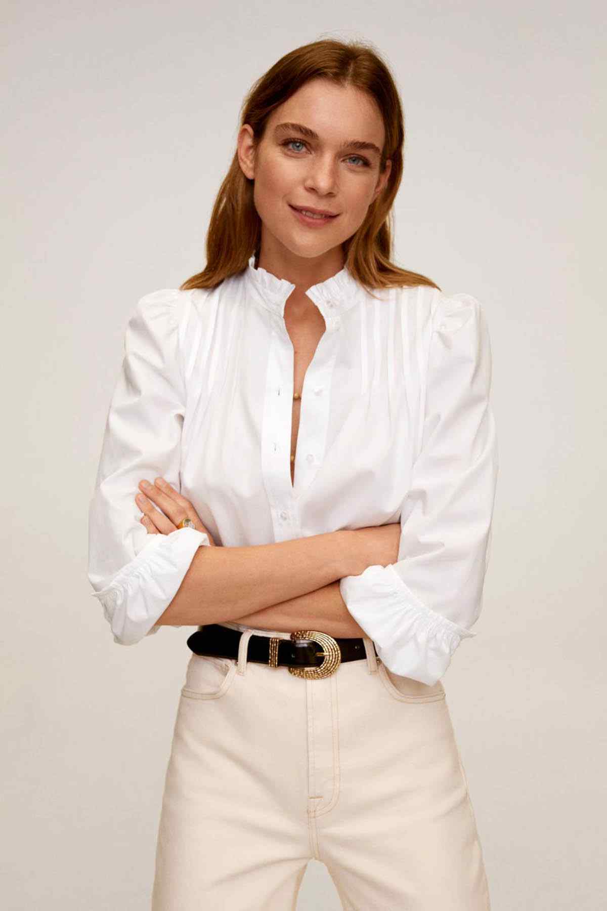 Off-white button-front blouse with ruffled collar and long puff sleeves