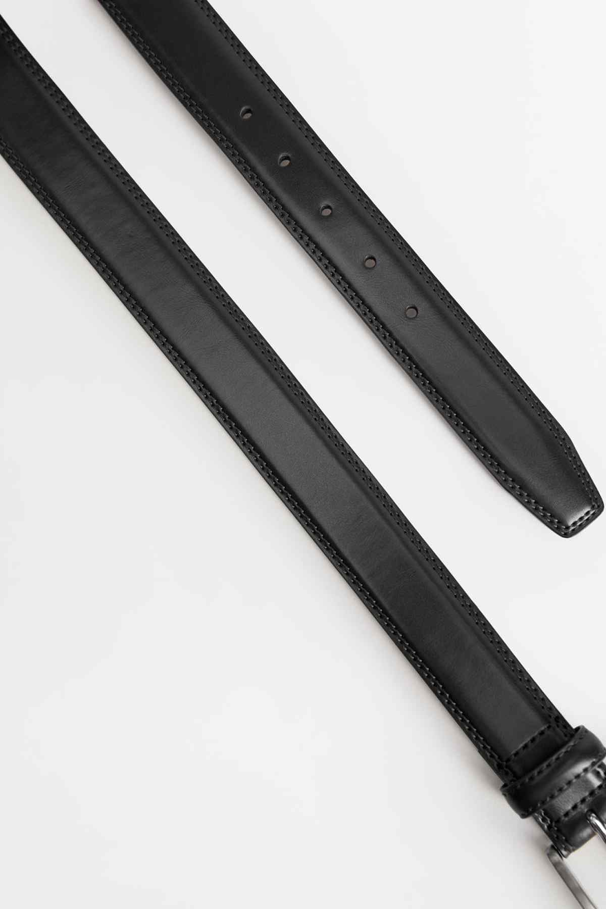 Black leather belt strap with punched holes and double stitching