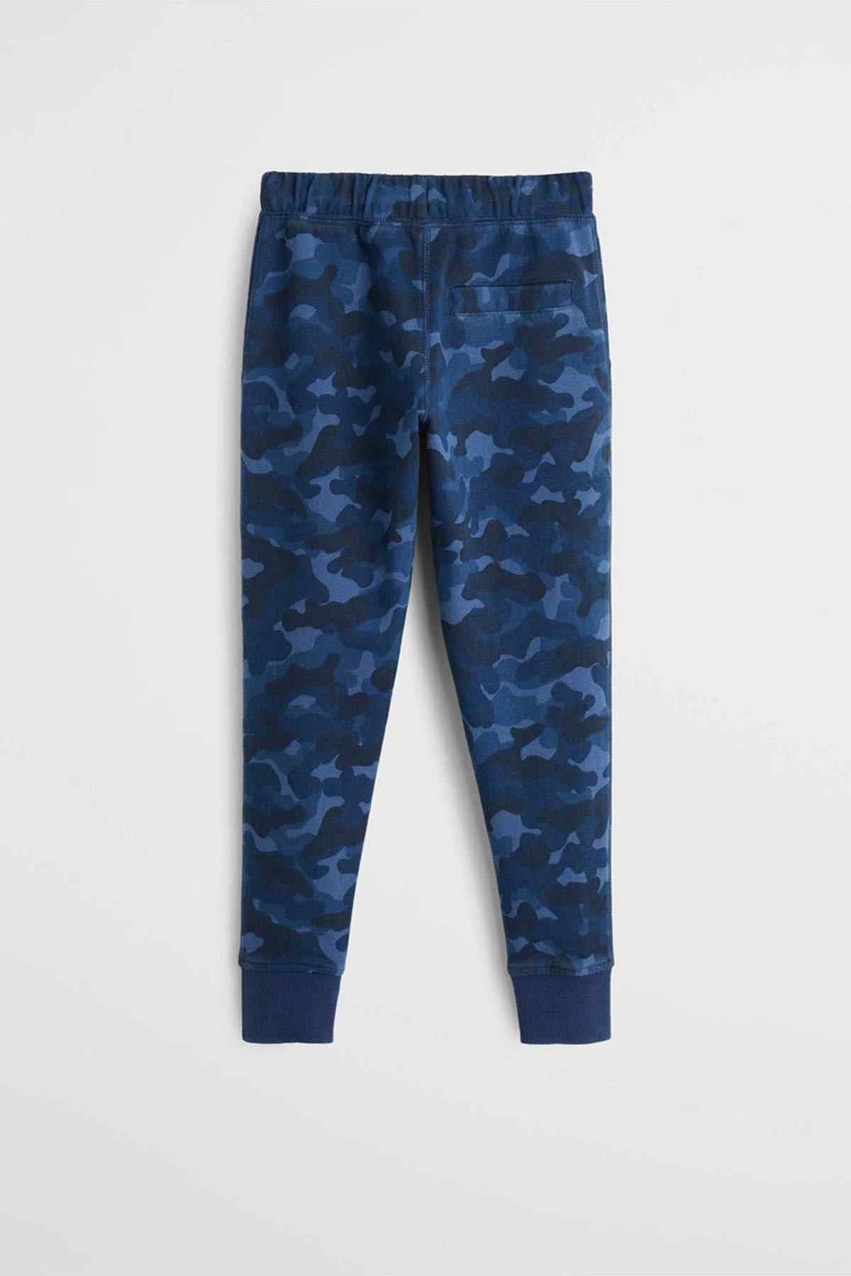 Navy camo jogger pants with elastic waist, tapered legs and ribbed cuffs