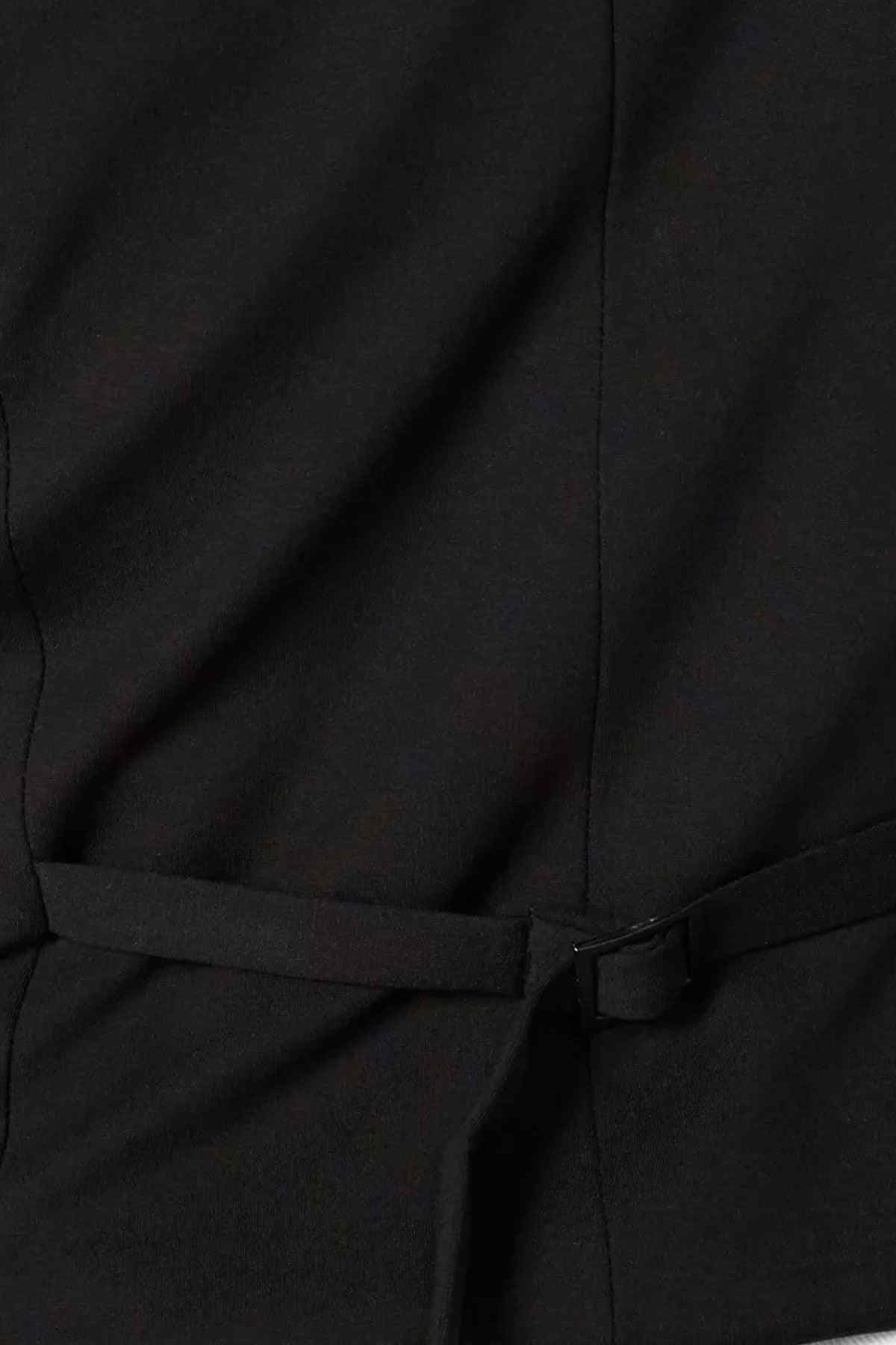 Black vest with waist belt and side seam tab at lower front