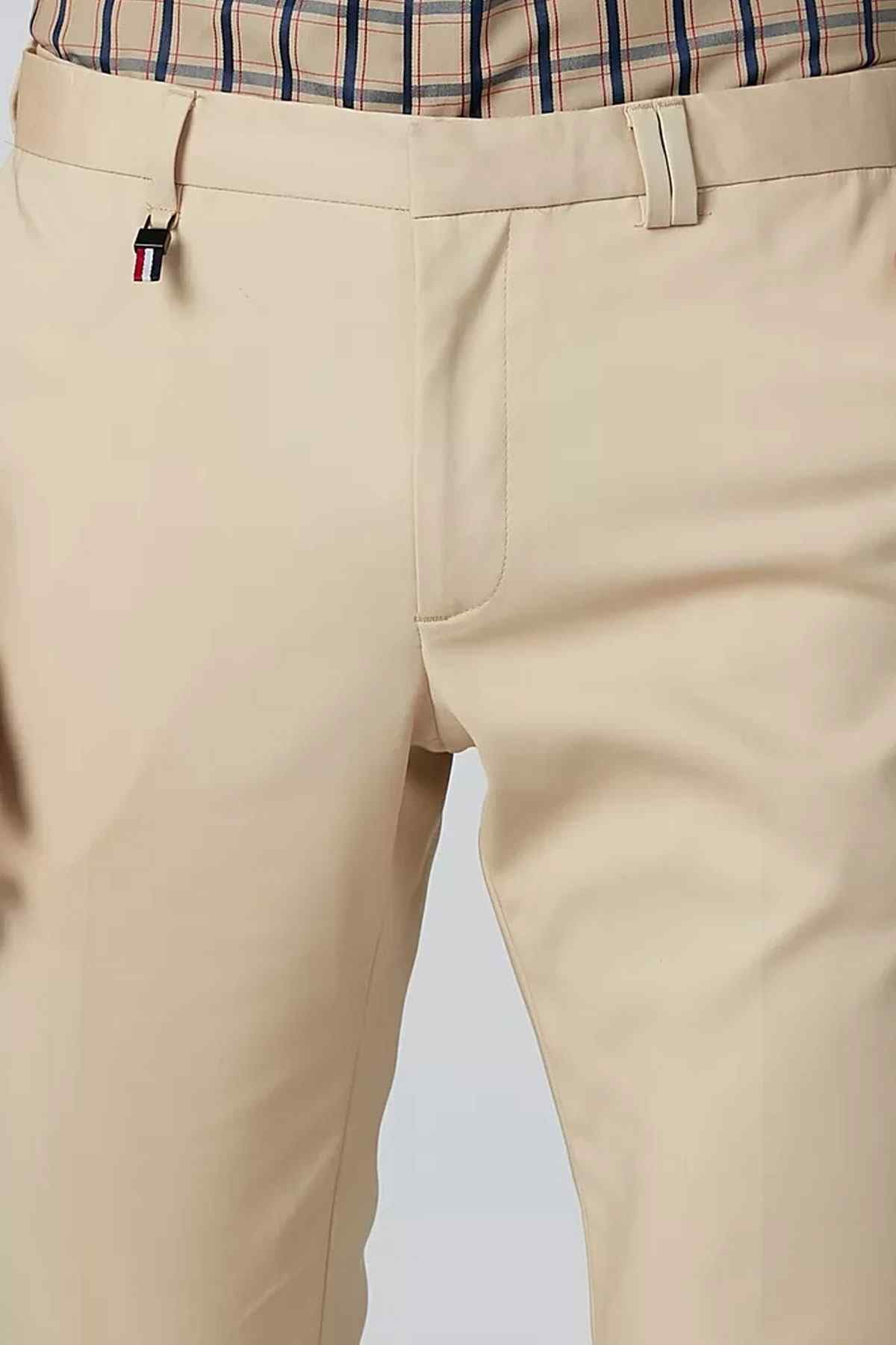Splash tan chino pants close-up of zipper fly, belt loop, and side pocket