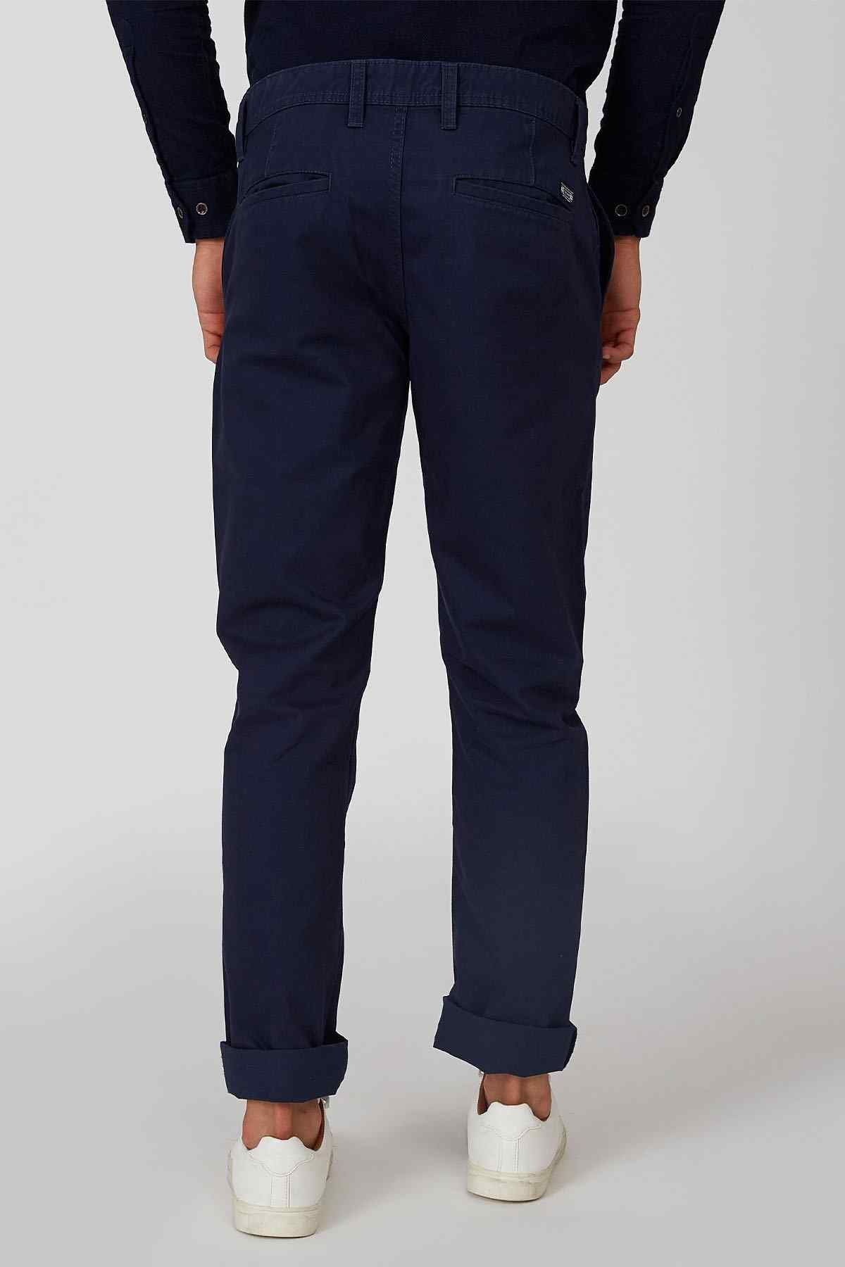 Navy trousers with rear yoke and pleats, cuffed hem