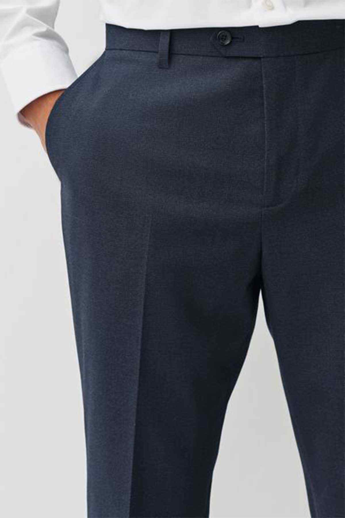 Navy suit trousers close-up of front panel and buttoned fly