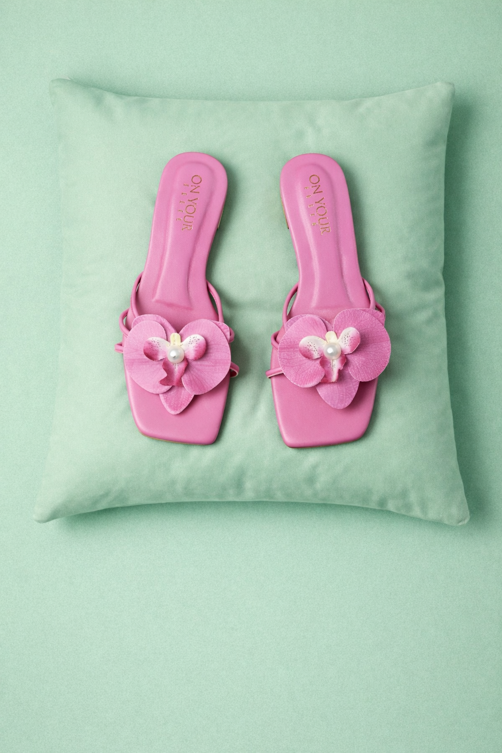 Dark pink flat slide sandals with pink flower applique and pearl bead detail