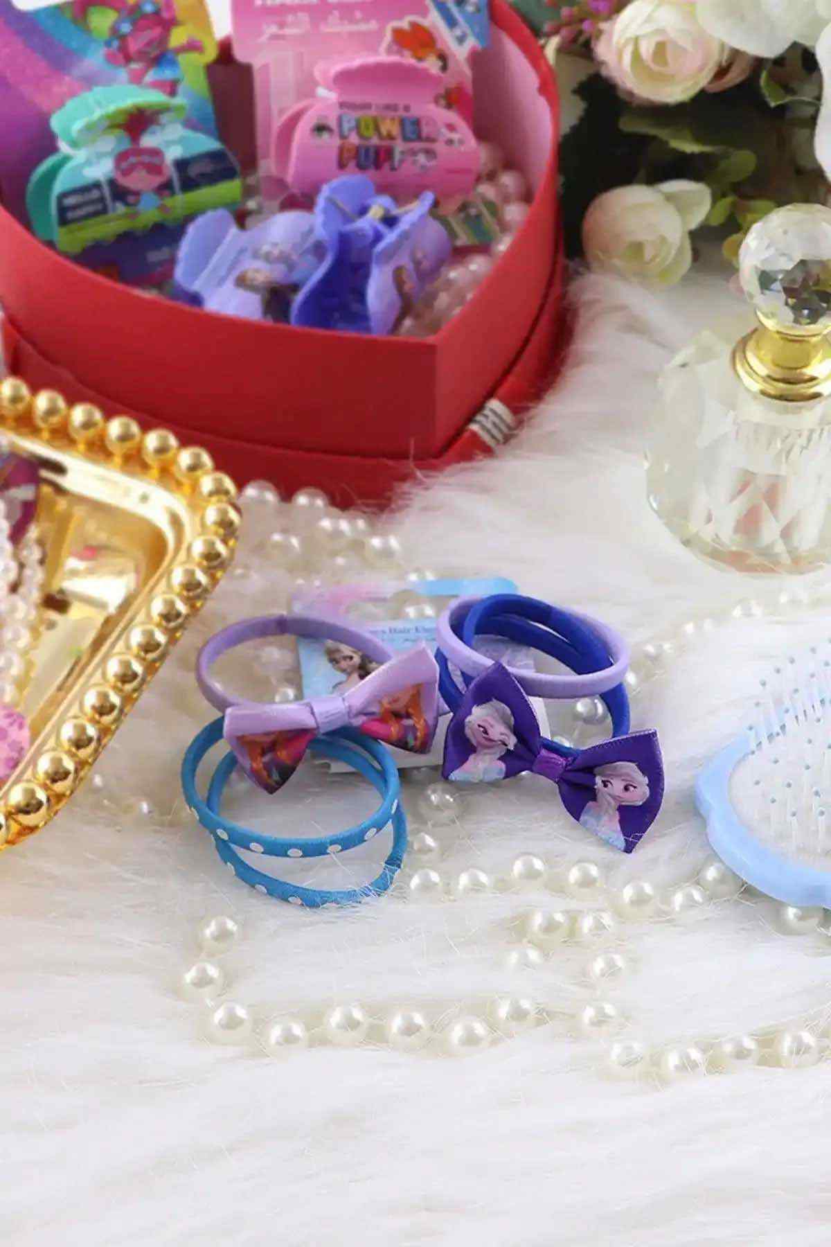 Multicolor bow hair elastics with character prints and decorative pearl strand