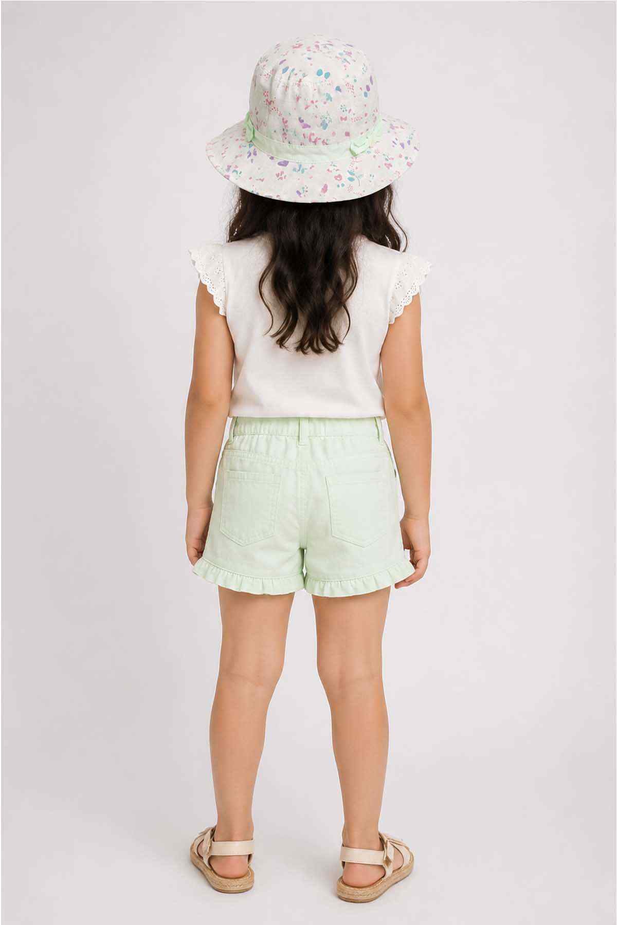 Kids bucket hat with pastel paint-splatter print and mint underside trim