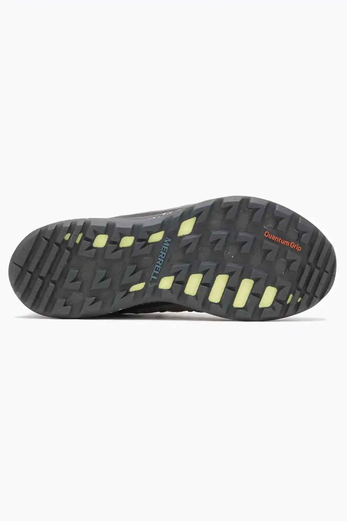 Merrell trail shoe outsole with deep tread and lime accents