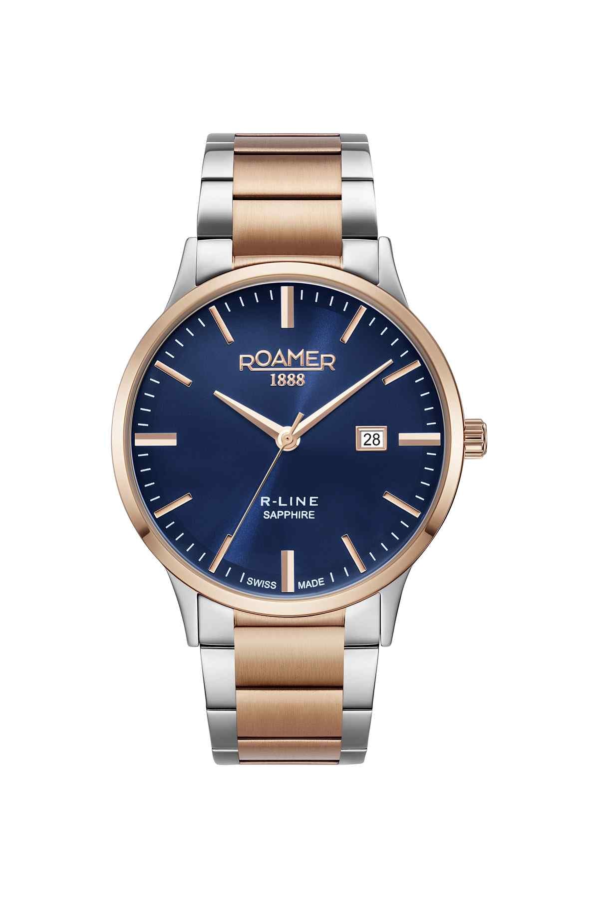Two-tone wristwatch with dark blue dial, gold hands, and date window at 3 o'clock