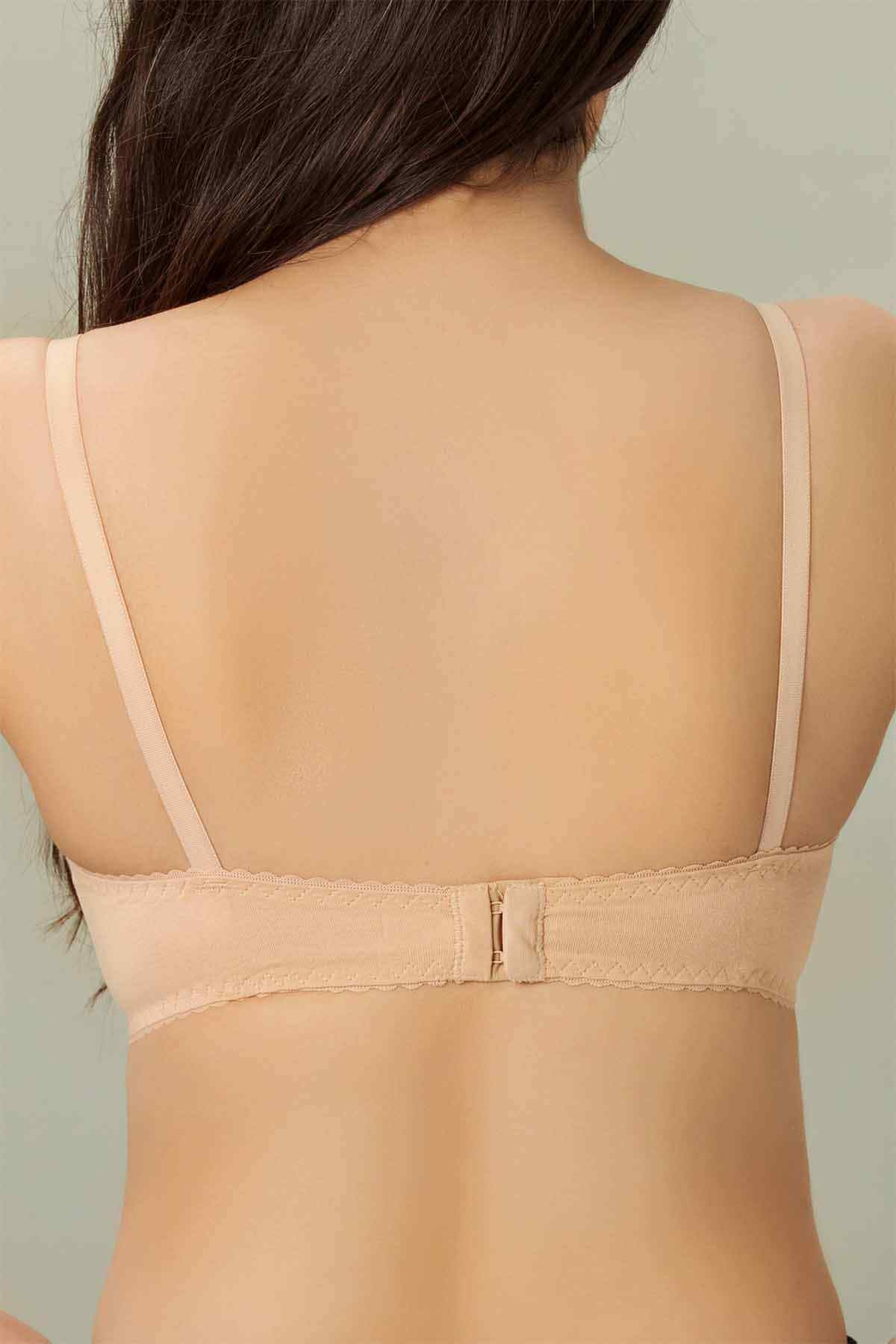 Bebelle skin-colored bra back view with adjustable straps and hook-and-eye closure