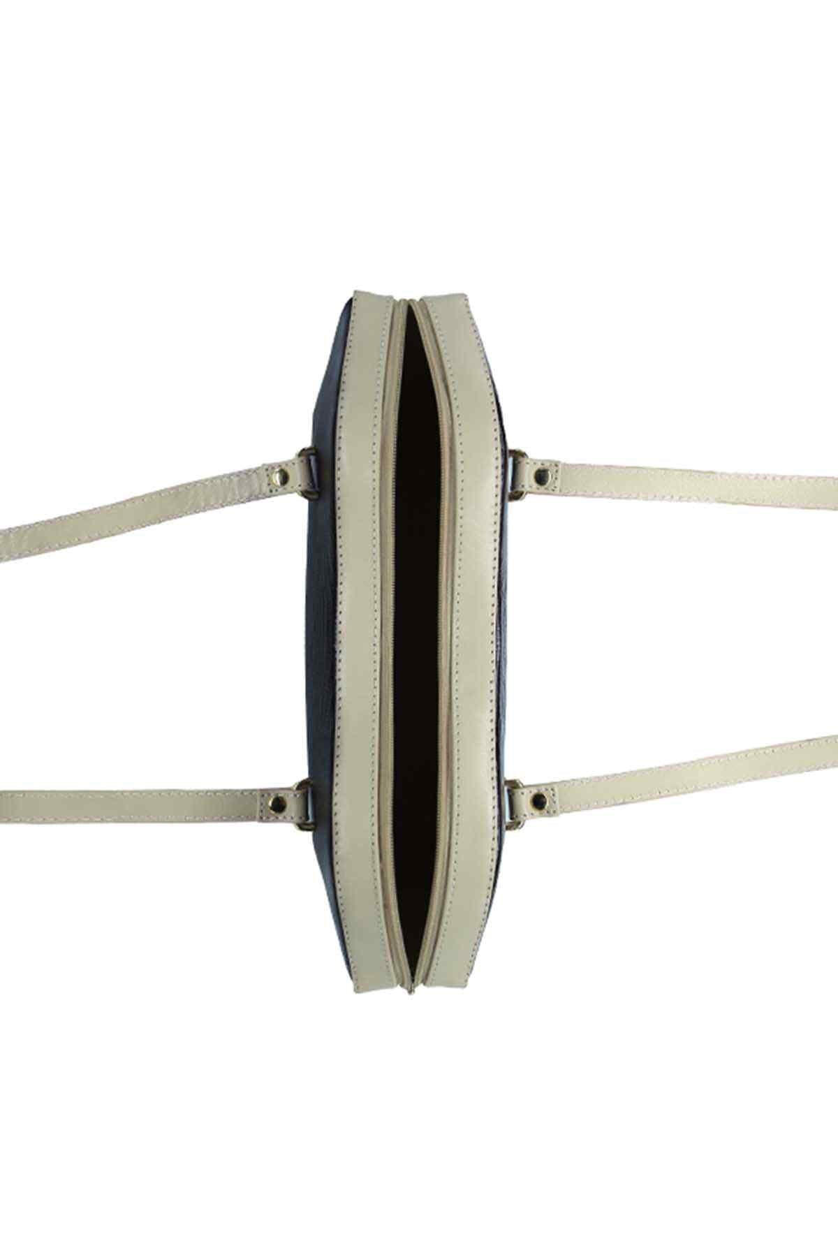 Lafanzo handbag side view with light lining and dual carry straps