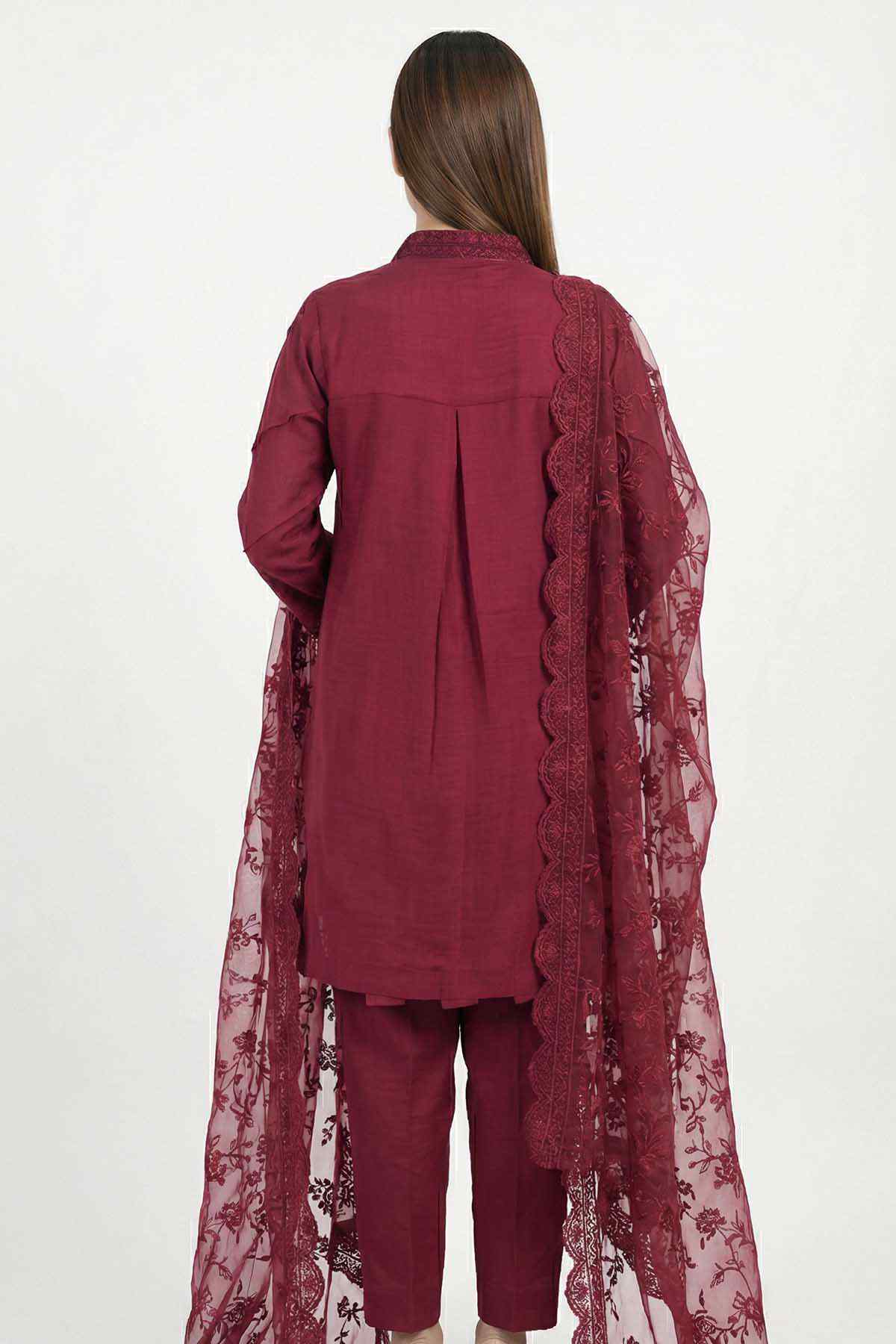 Back view of maroon tunic set with sheer floral dupatta and lace trim