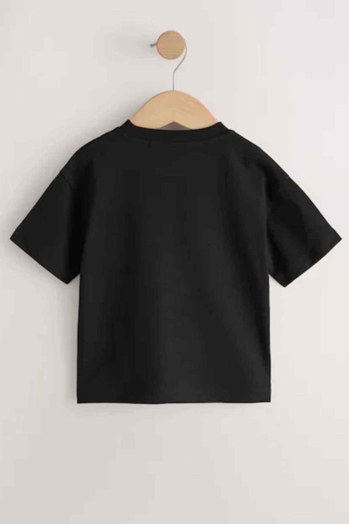 Black kids T-shirt on hanger, solid back with short sleeves